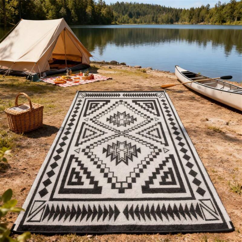 Angle. HTUTWOO - 9' x 18' Outdoor Reversible Rug - Waterproof Plastic Straw Patio Mat with Carry Bag, Foldable Camping Carpet - Black Grey.