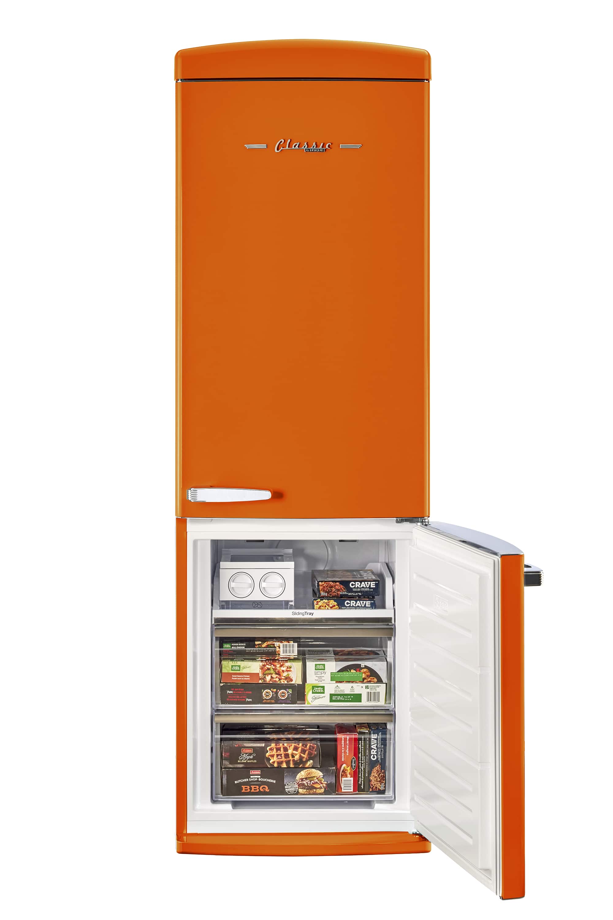 The image features a bright orange refrigerator with a white interior. The refrigerator is filled with various food items, including multiple bottles, a bowl, and a sandwich. The refrigerator is also stocked with a variety of snacks, making it a well-stocked and colorful appliance.