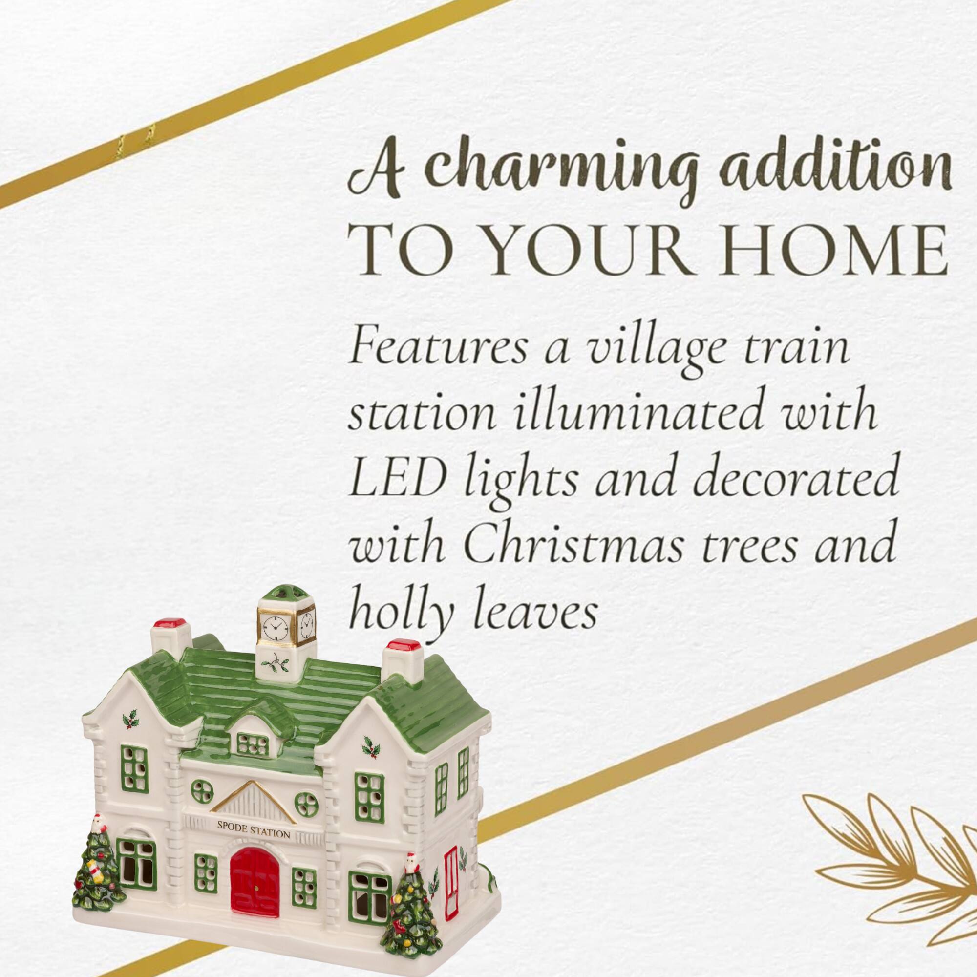 A charming addition TO YOUR HOME  
Features a village train station illuminated with LED lights and decorated with Christmas trees and holly leaves  
SPODE STATION