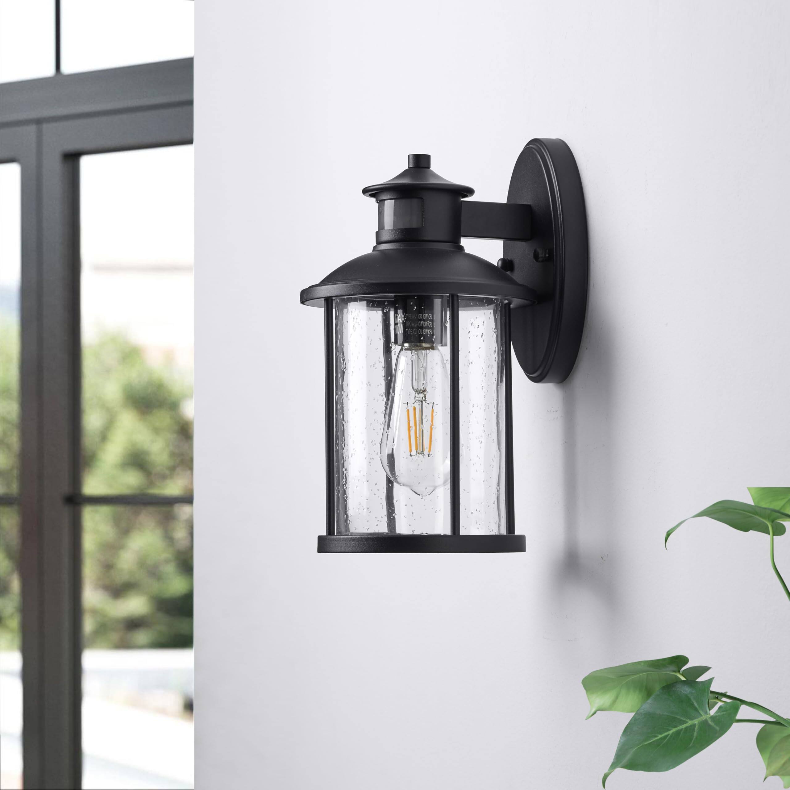 Left. VEGA AUTOMOTIVE - 11 Motion Sensor Outdoor Wall Light Fixture Dusk To Dawn With Seedy Glass Exterior For House Front Porch - Bronze 1 Pack H12.5".