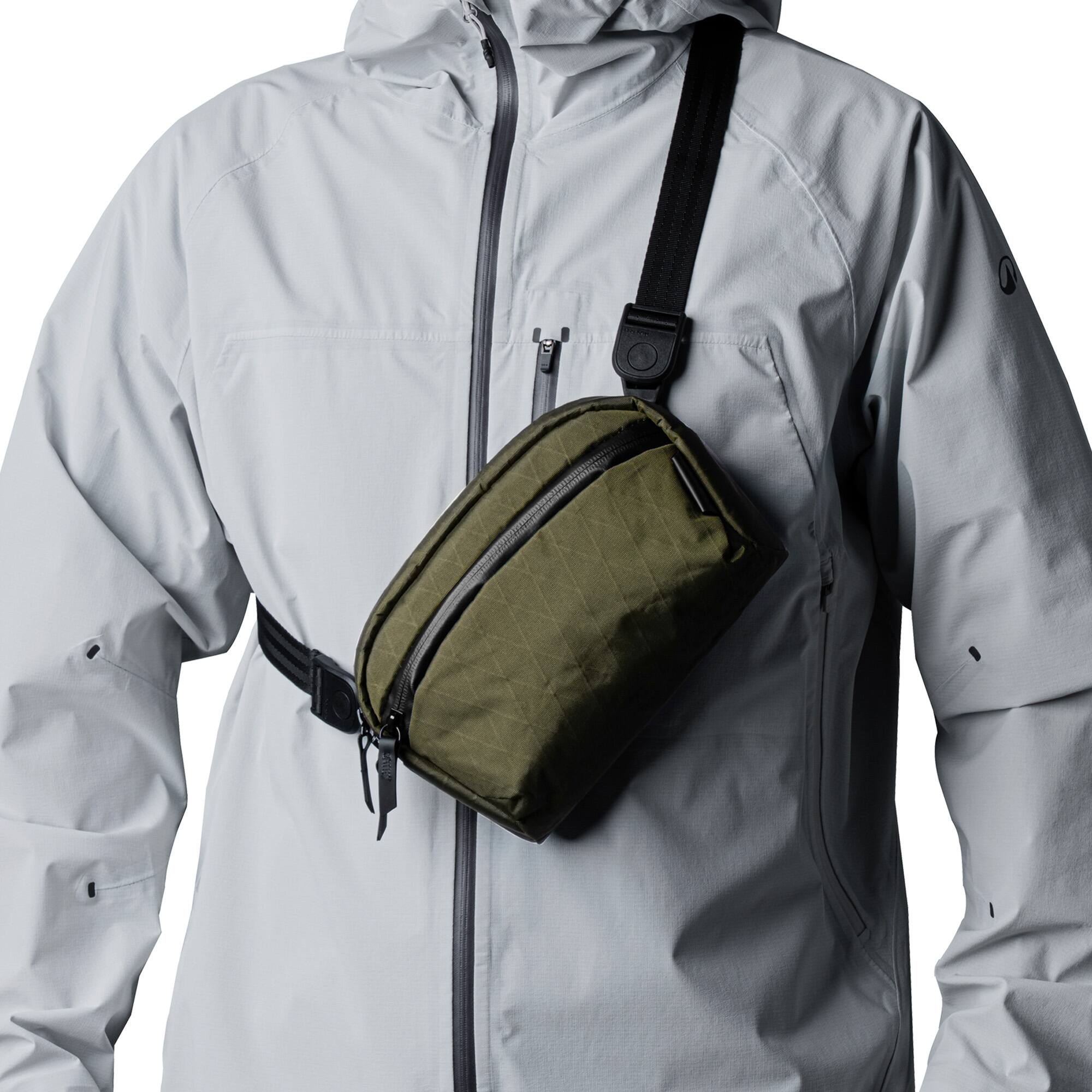 Alt View 4. ALPAKA - Travel Sling Bag 1L for Men, Detachable Strap Converts to Pouch, Phone Sleeve, Hidden Rear Pocket, YKK Zippers - Olive Green X-Pac X42.