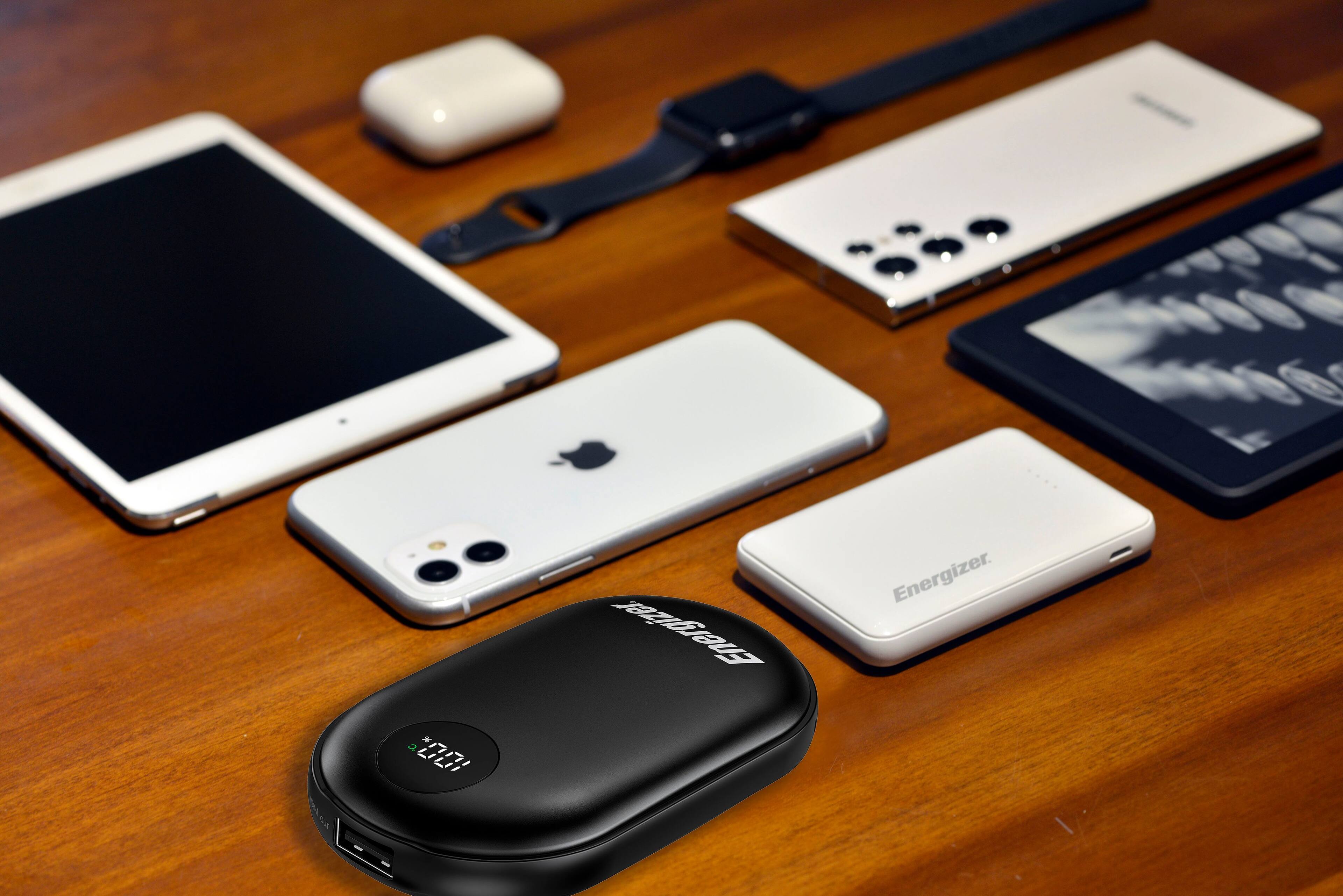 a cell phone, a tablet, a smartphone, a watch, a charger, and an Energizer.