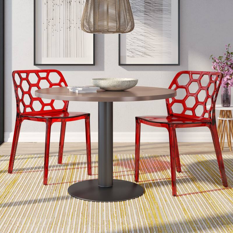 Angle. LeisureMod - Dynamic 2-Pieces Transparent Lucite Dining Chair with Honeycomb Cutout, Lightweight & Fully Assembled - Transparent Red.