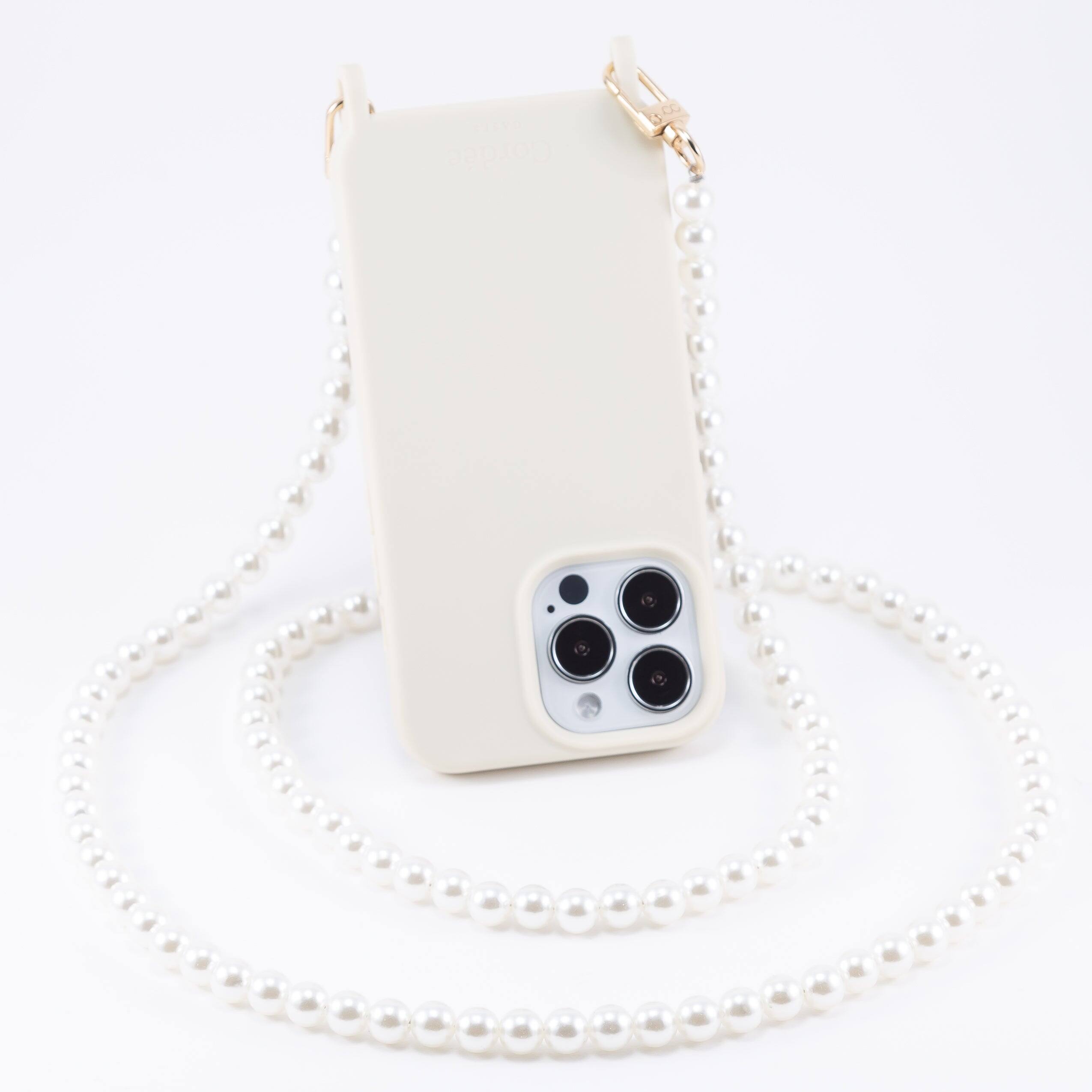 Angle. Cordée Cases - 3-Piece Crossbody Phone Case Set - Ivory.
