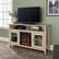 Alt View 15. Walker Edison - 58" Tall Glass Two Door Soundbar Storage Fireplace TV Stand for Most TVs Up to 65" - White Oak.