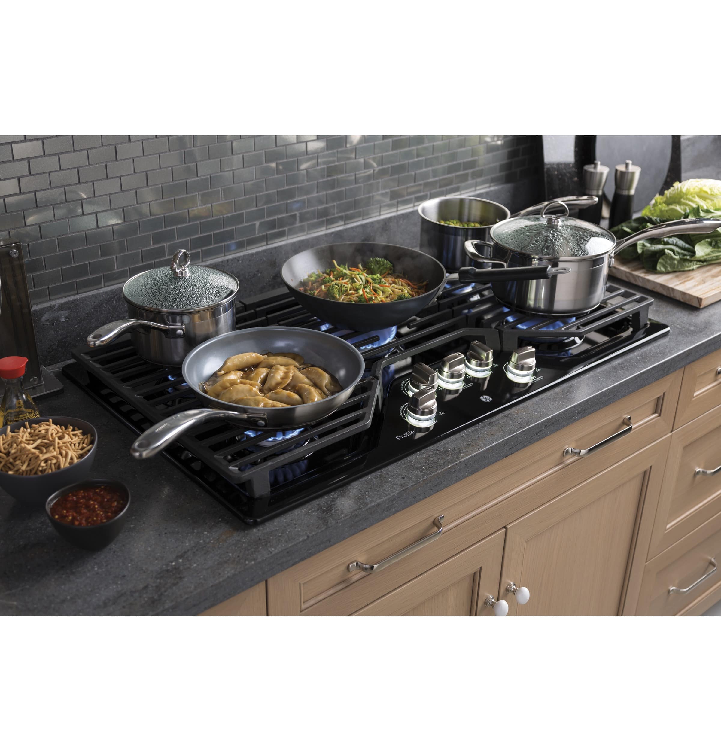 Alt View 16. GE - Profile Series 36" Built-In Gas Cooktop - Black.