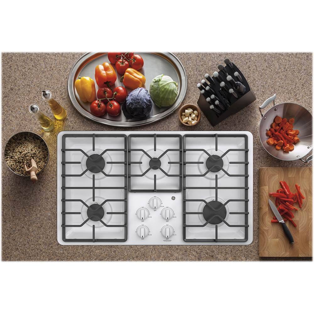 Alt View 12. GE - 36" Gas Cooktop - White.