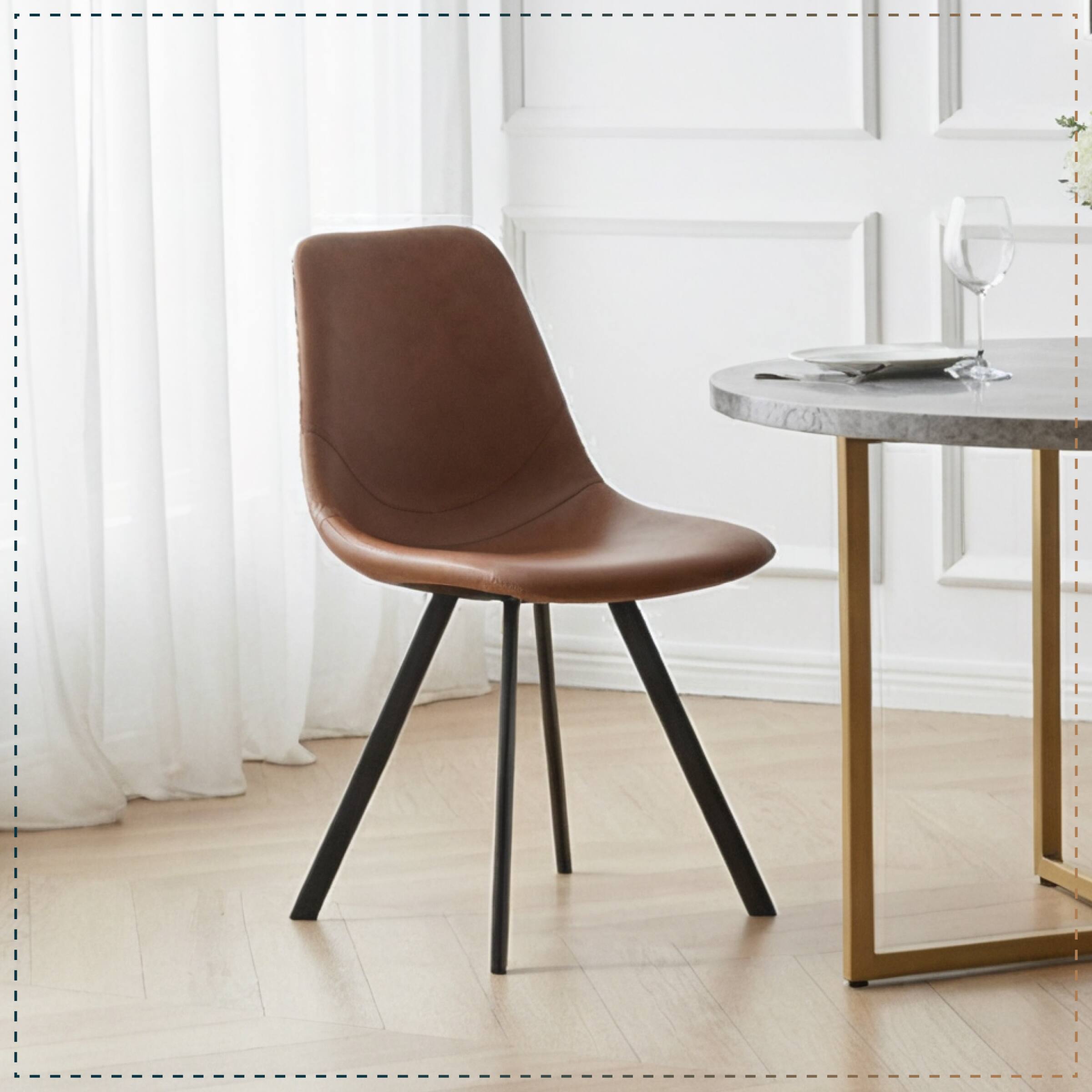 Angle. LeisureMod - Markley Modern Upholstered Dining Chair, Distressed Leather Ergonomic Kitchen Chair with Iron Legs - Light Brown.