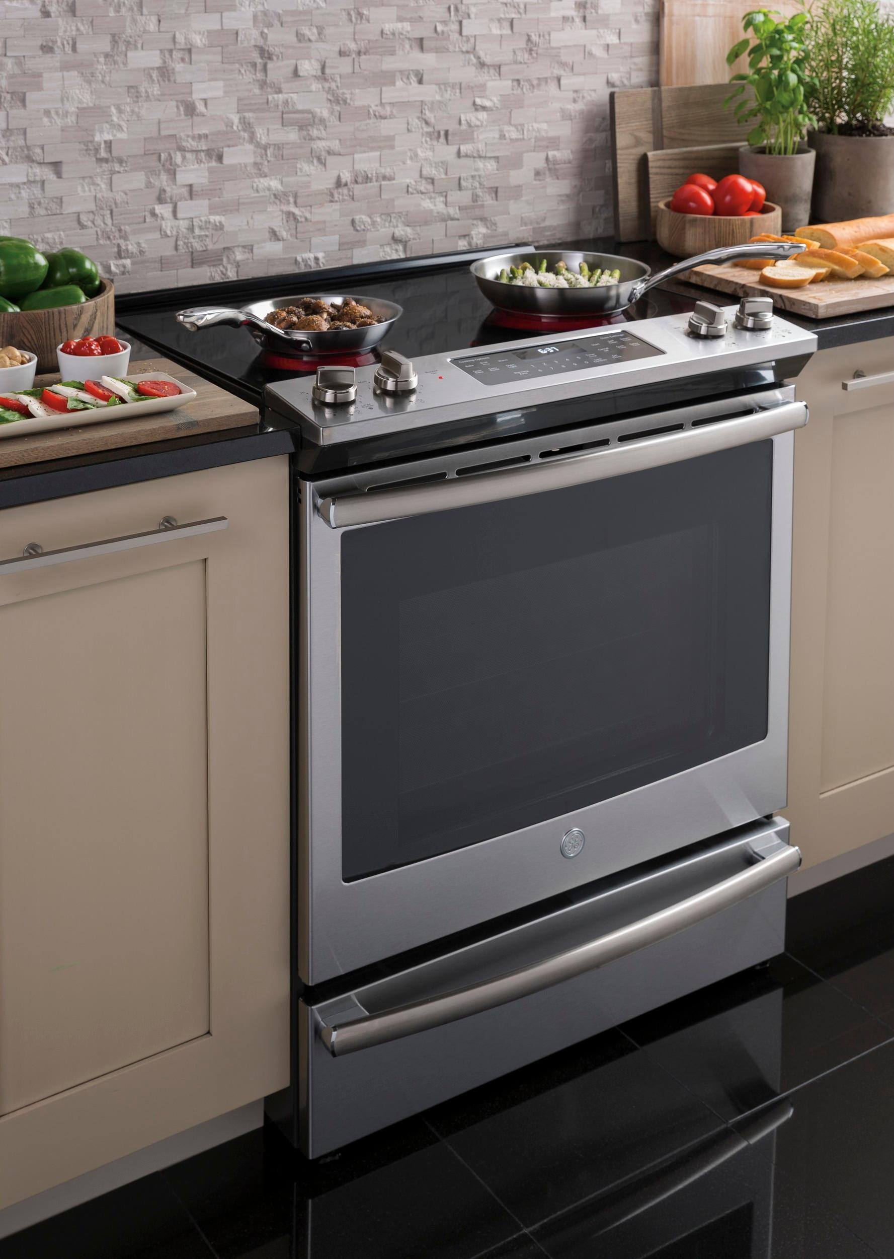 Alt View 11. GE - 5.3 Cu. Ft. Slide-In Electric Convection Range - Stainless Steel.