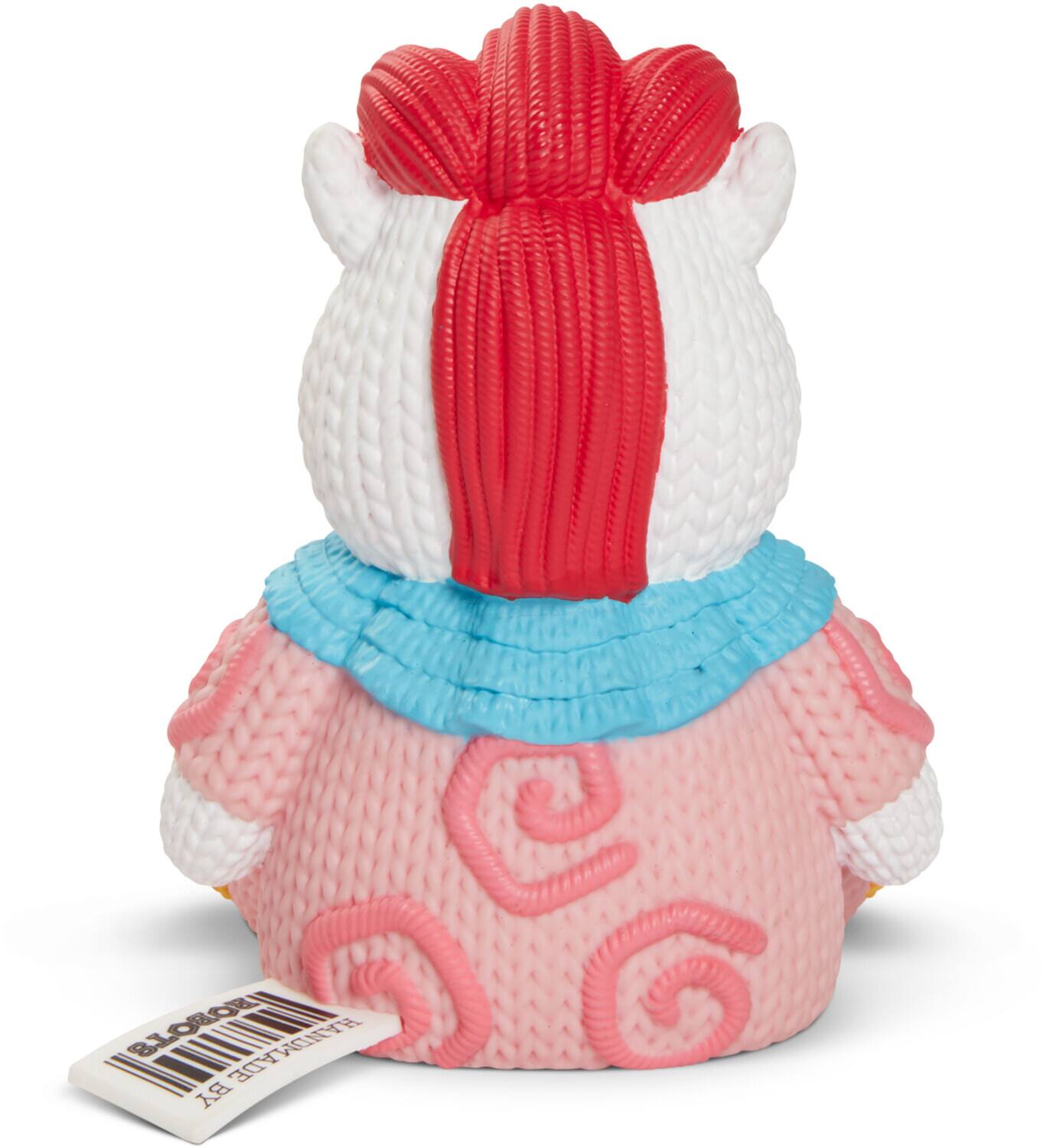 The text on the image is "AETEN BLOBORI RANDMADE BY". It appears to be a handmade item, possibly a toy or decorative piece.