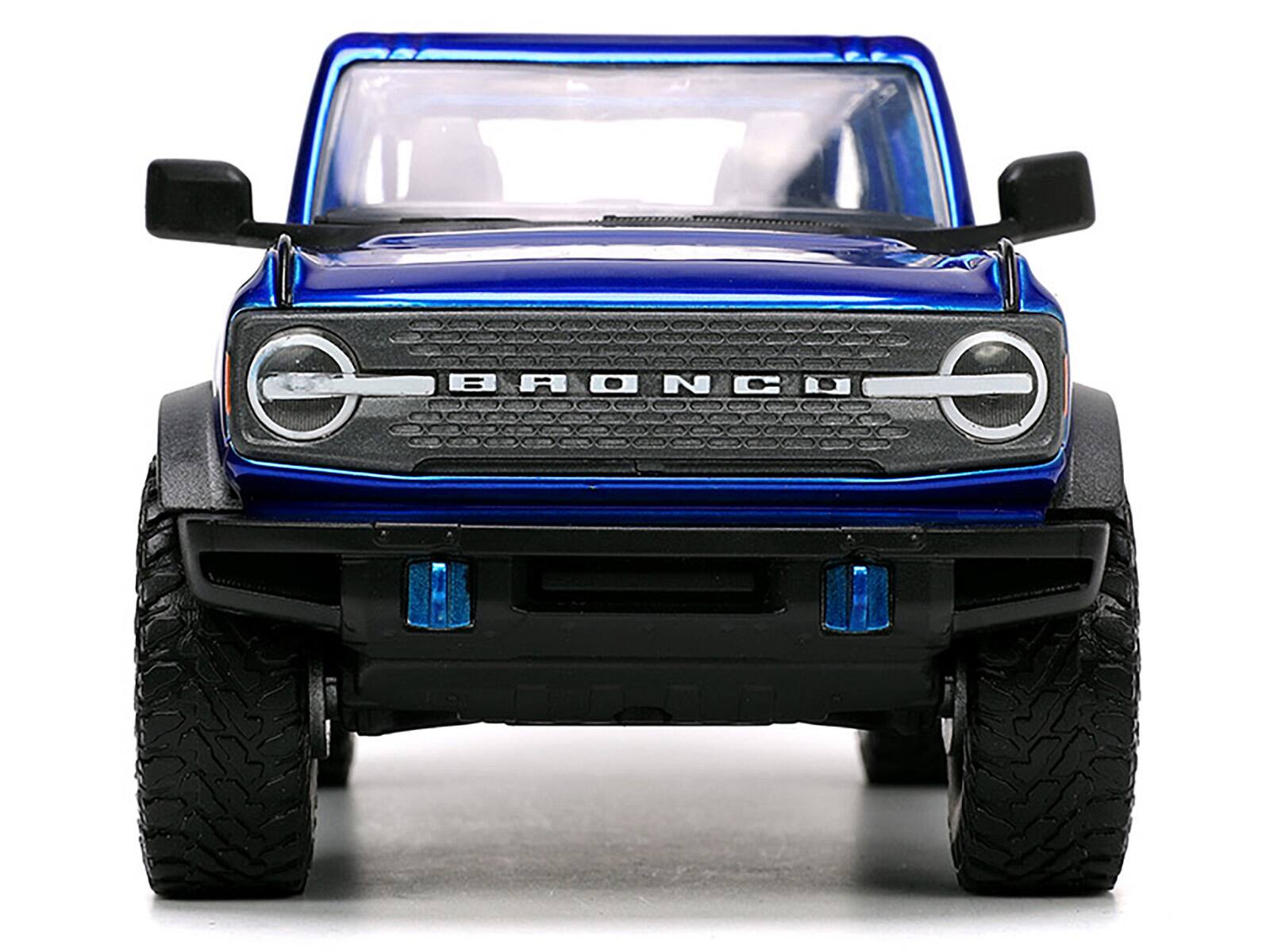 Alt View 5. Jada - 2021 Ford Bronco Open-Top Candy Blue Metallic with Extra Wheels "Just Trucks" Series 1/24 Diecast Model Car by Jada.