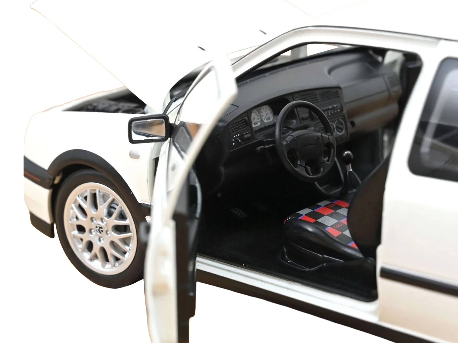 Left. Norev - 1996 Volkswagen Golf GTI Candy White "20 Years Anniversary Edition" 1/18 Diecast Model Car by Norev - White.