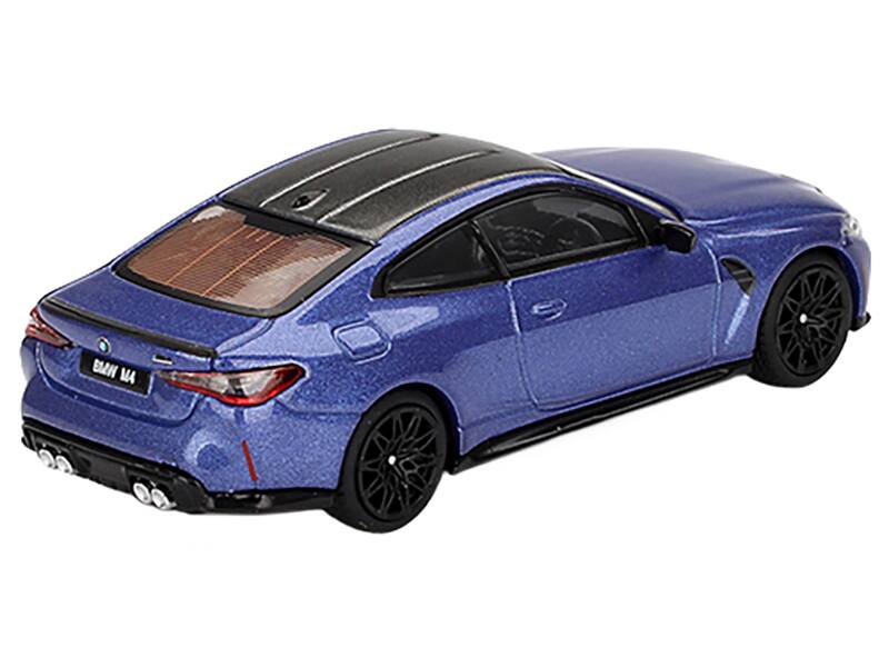 Left. Mini GT - BMW M4 Competition Portimao Blue Metallic with Carbon Top Limited Edition 1/64 Diecast Model Car by Mini GT - Blue Metallic with Carbon.