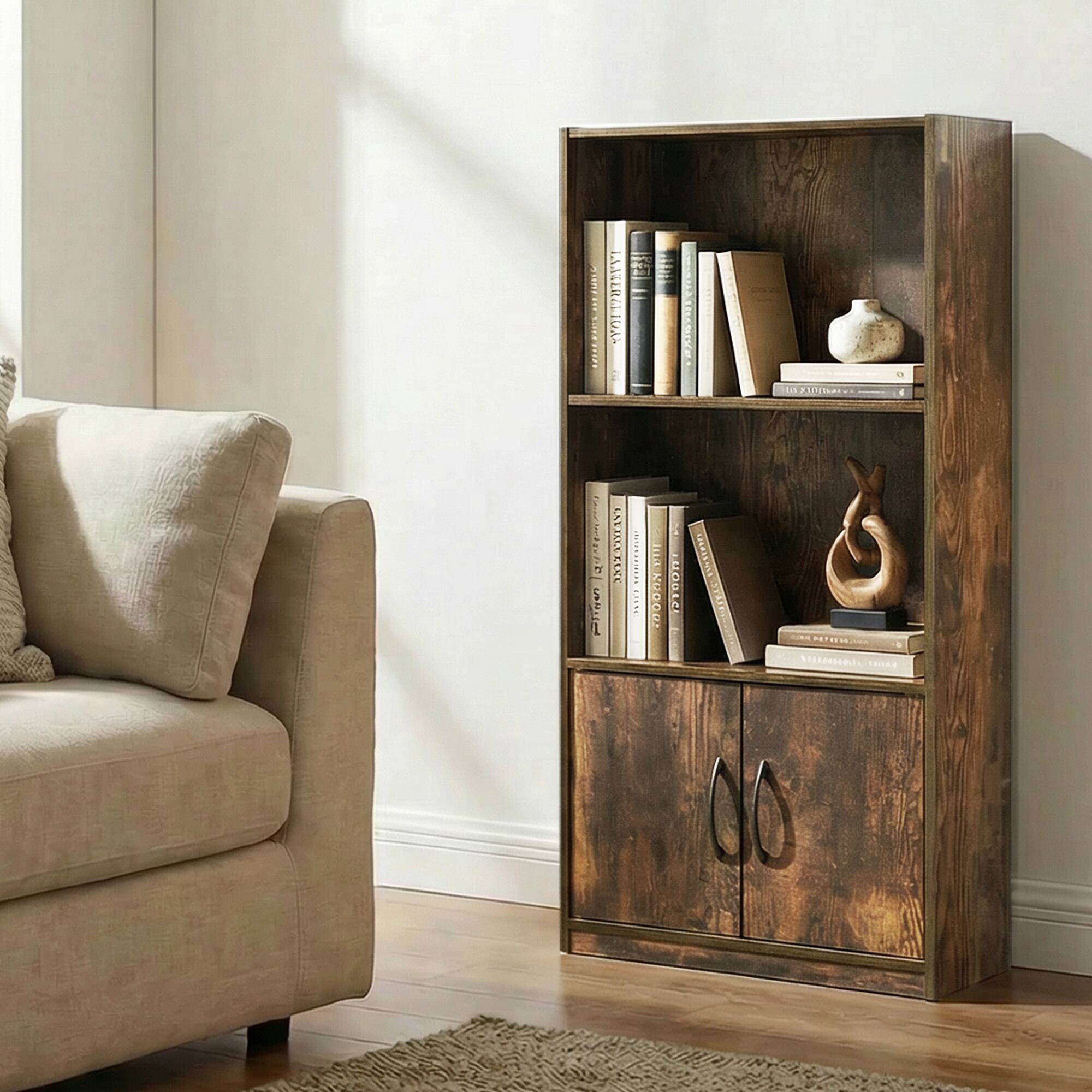 It's a lovely air-conditioned room with a cozy couch and a wooden bookshelf. The bookshelf has several books, a vase, and a decorative sculpture. The room is well-lit with natural light.