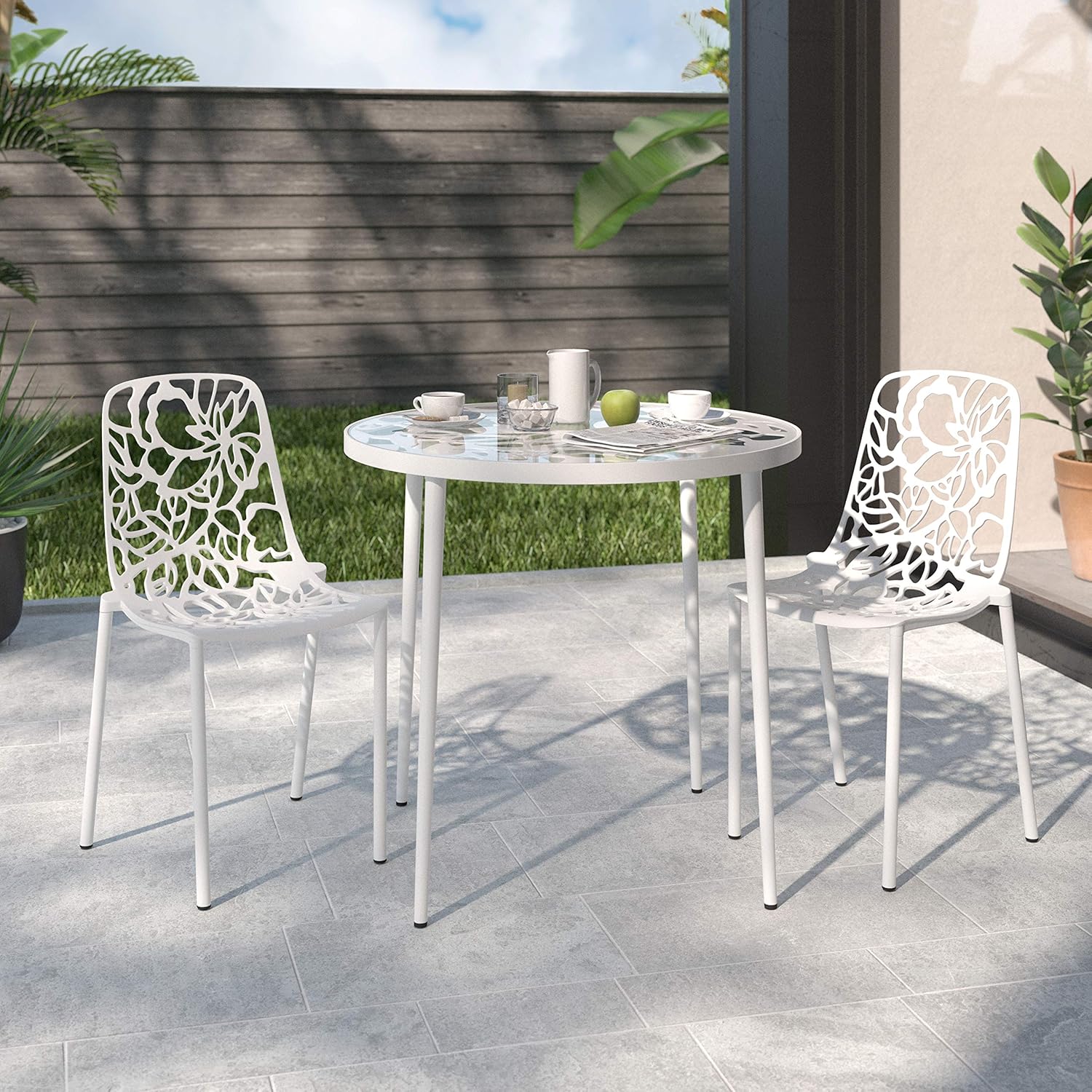 Angle. LeisureMod - Devon (Set of 2) Aluminum Outdoor Dining Chair, UV Resistant & Stackable Floral Design Accent Chair - Fully Assembled - White.