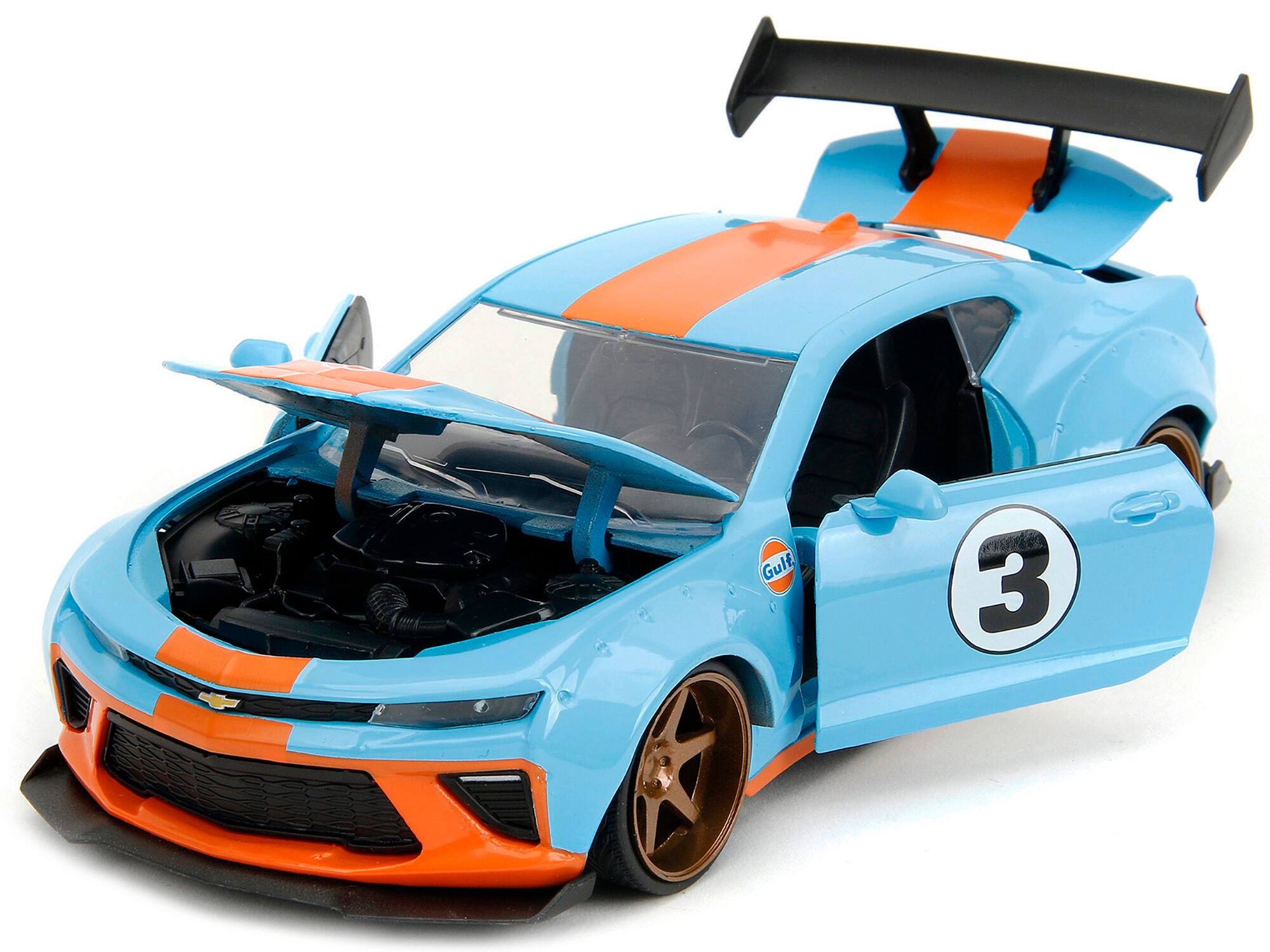 Angle. Jada - 2016 Chevrolet Camaro Widebody #3 Light Blue with Orange Stripes "Gulf Oil" "Wide Body" Series 1/24 - Light Blue With Orange.