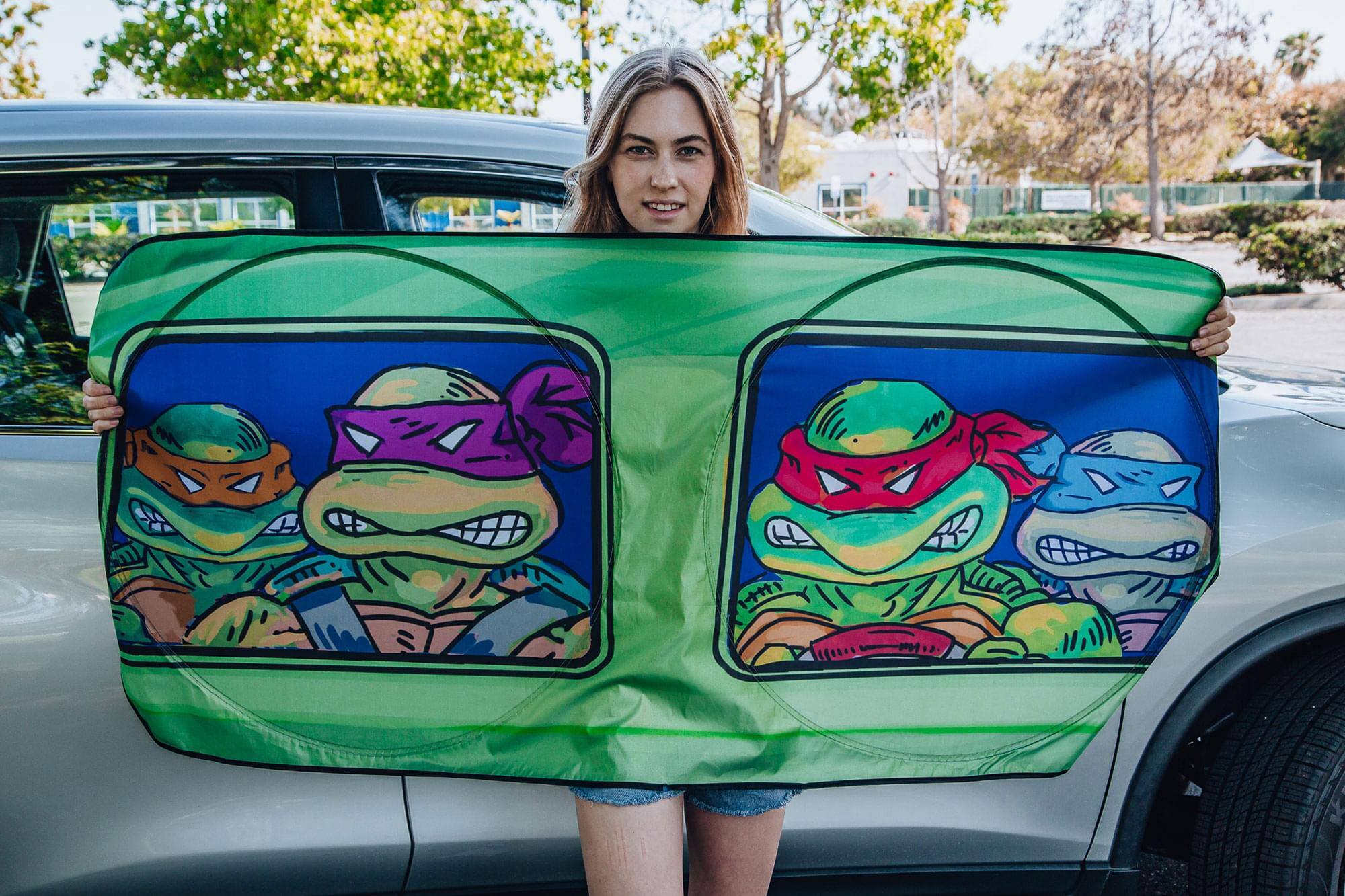 Alt View 10. Surreal Entertainment - Teenage Mutant Ninja Turtles Sunshade for Car Windshield | 64 x 32 Inches - Green.
