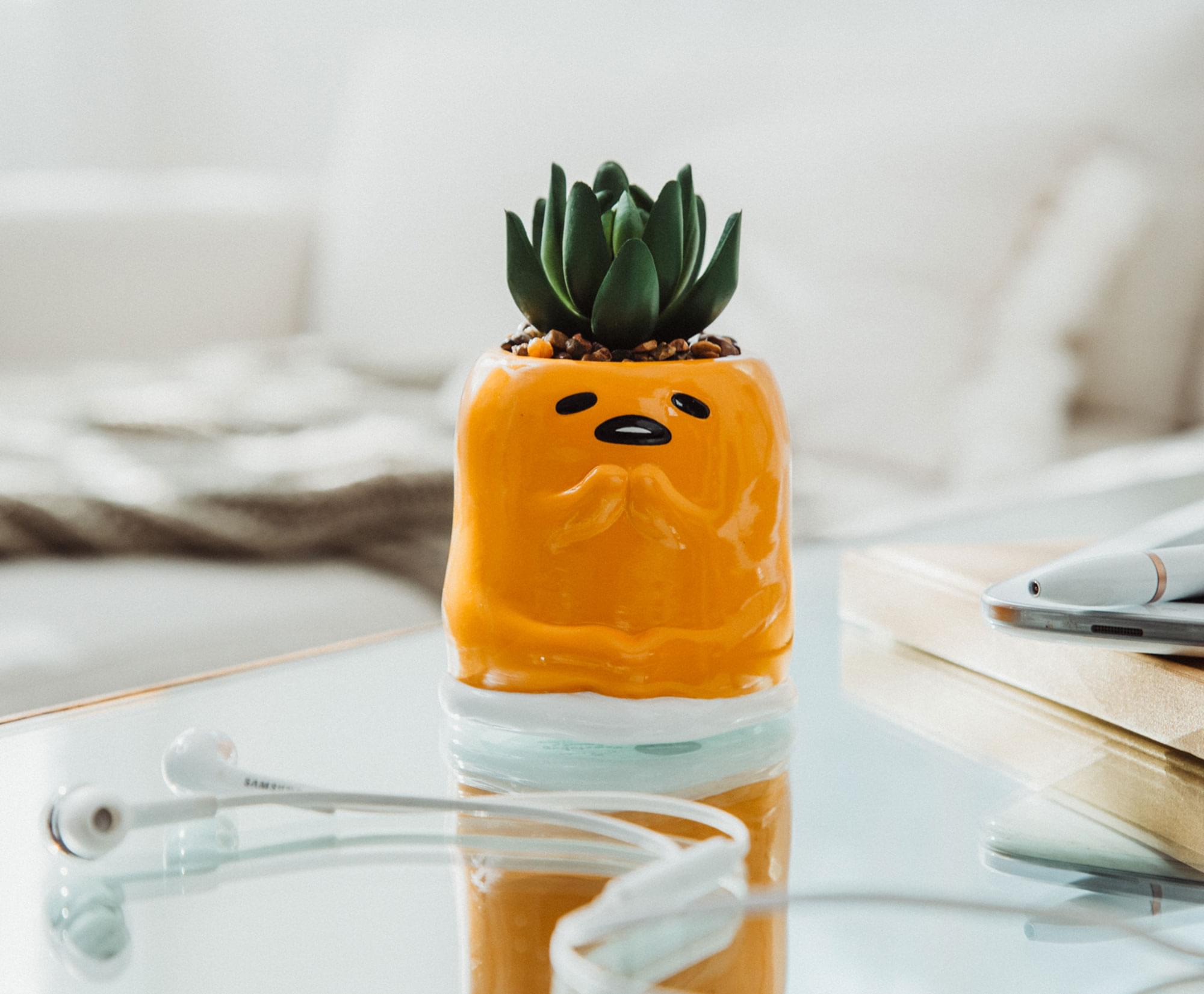 Alt View 2. Silver Buffalo - Sanrio Gudetama Meditation 3-Inch Mini Planter With Artificial Succulent - Yellow.