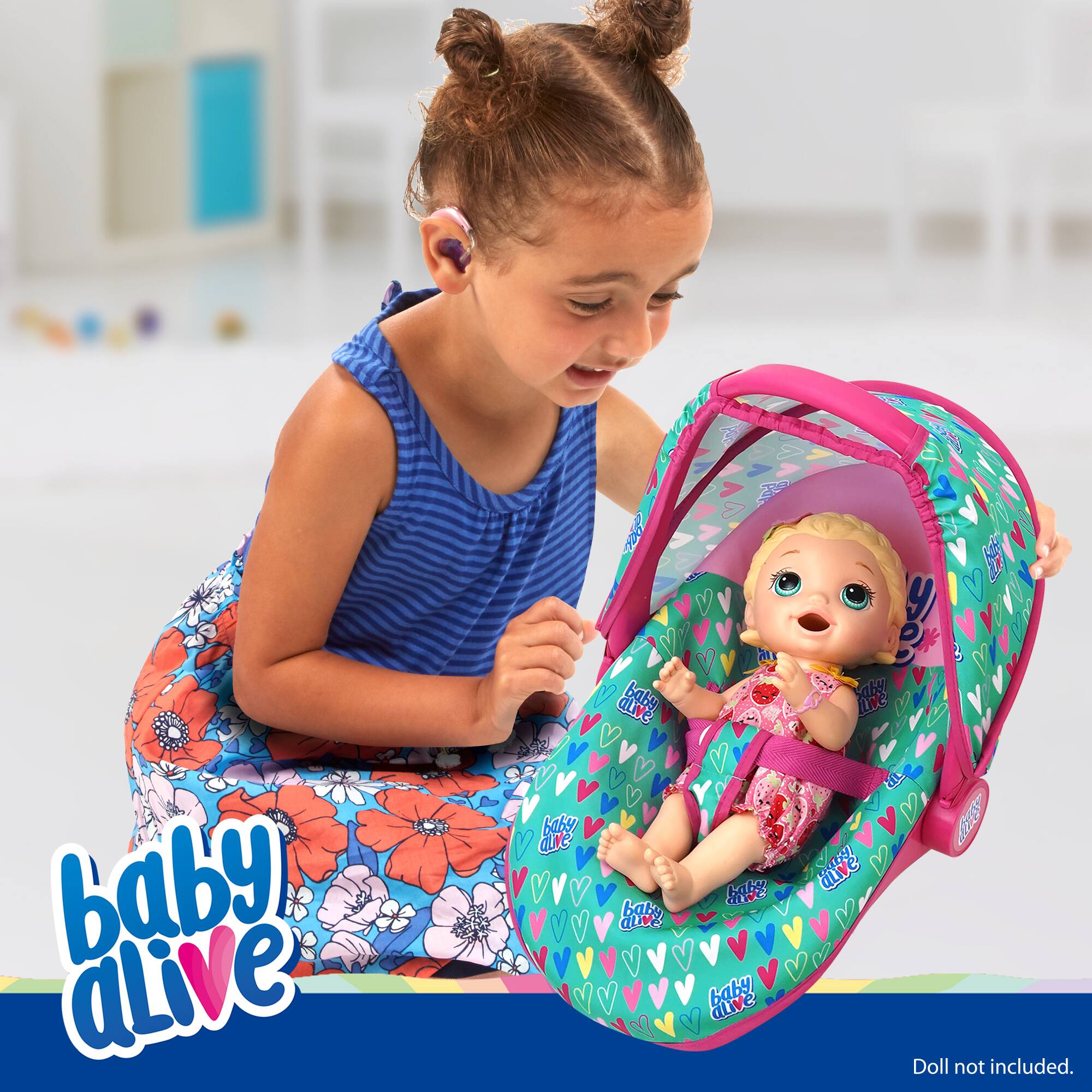 The correct text is: "Baby Alive doll not included."