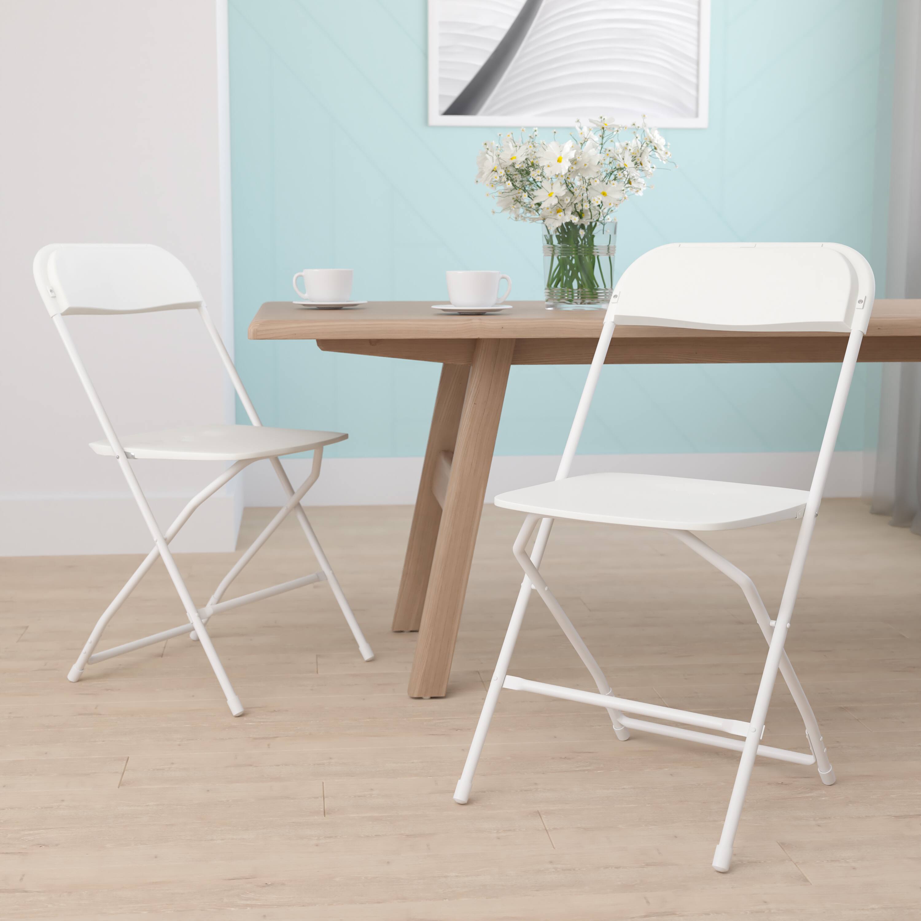Alt View 1. Emma + Oliver - Set of 2 Stackable Folding Plastic Chairs - 650 LB Weight Capacity - White.