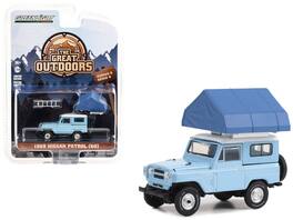 Greenlight - 1969 Nissan Patrol (60) Top and Camp'otel Cartop Sleeper Tent "The Great Outdoors" Series 3 1/64 - Light Blue With White