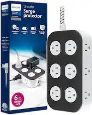 The image features a surge protector with a total of 12 outlets, including 3 USB ports. The surge protector is designed to provide protection for electronic devices and appliances in the home. It has a 6-foot braided cord and is made by the Philips brand. The surge protector is designed to handle up to 3000 joules of surge protection, ensuring the safety of your devices and appliances.
