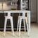Left. Simpli Home - Rayne 30 inch Metal Bar Stool (Set of 2) - Distressed White.