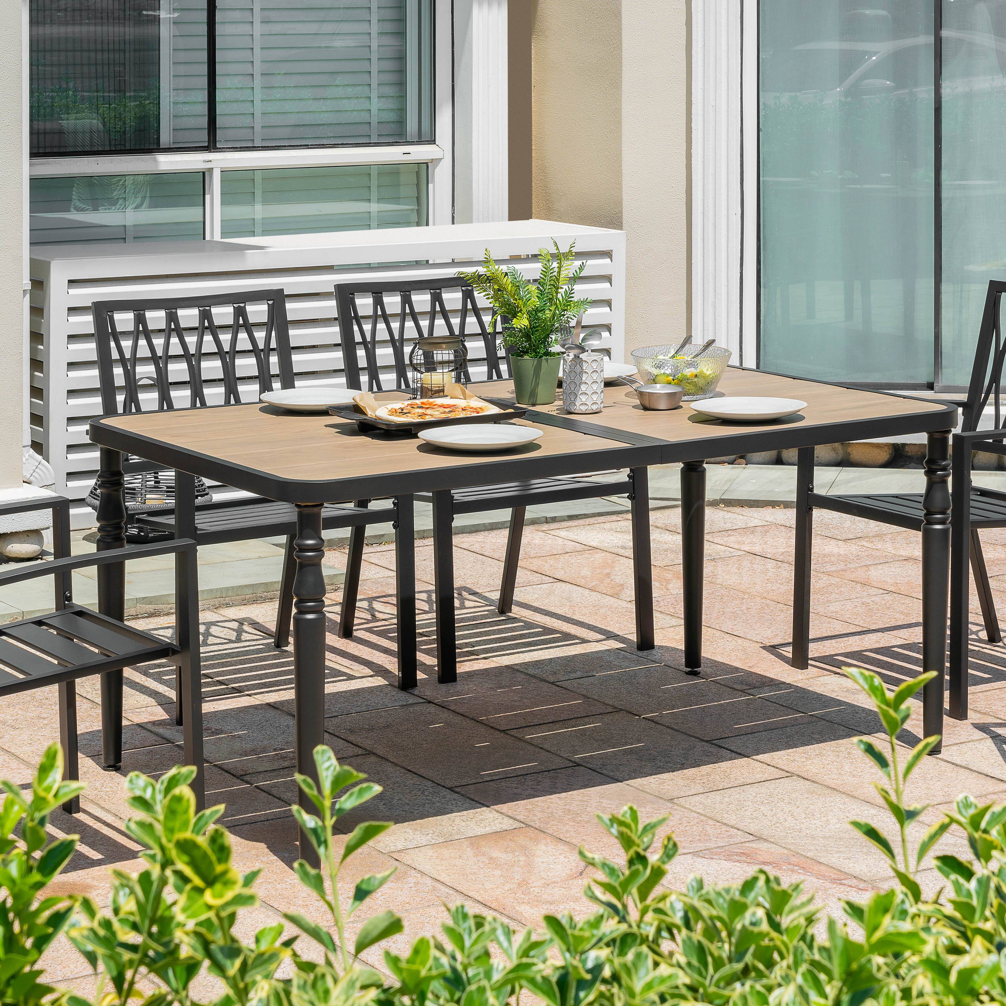 Left. Nuu Garden - Outdoor Rectangle Metal Dining Table with Wood-Grain Tabletop, Umbrella Hole - Black and wood-grain finish.