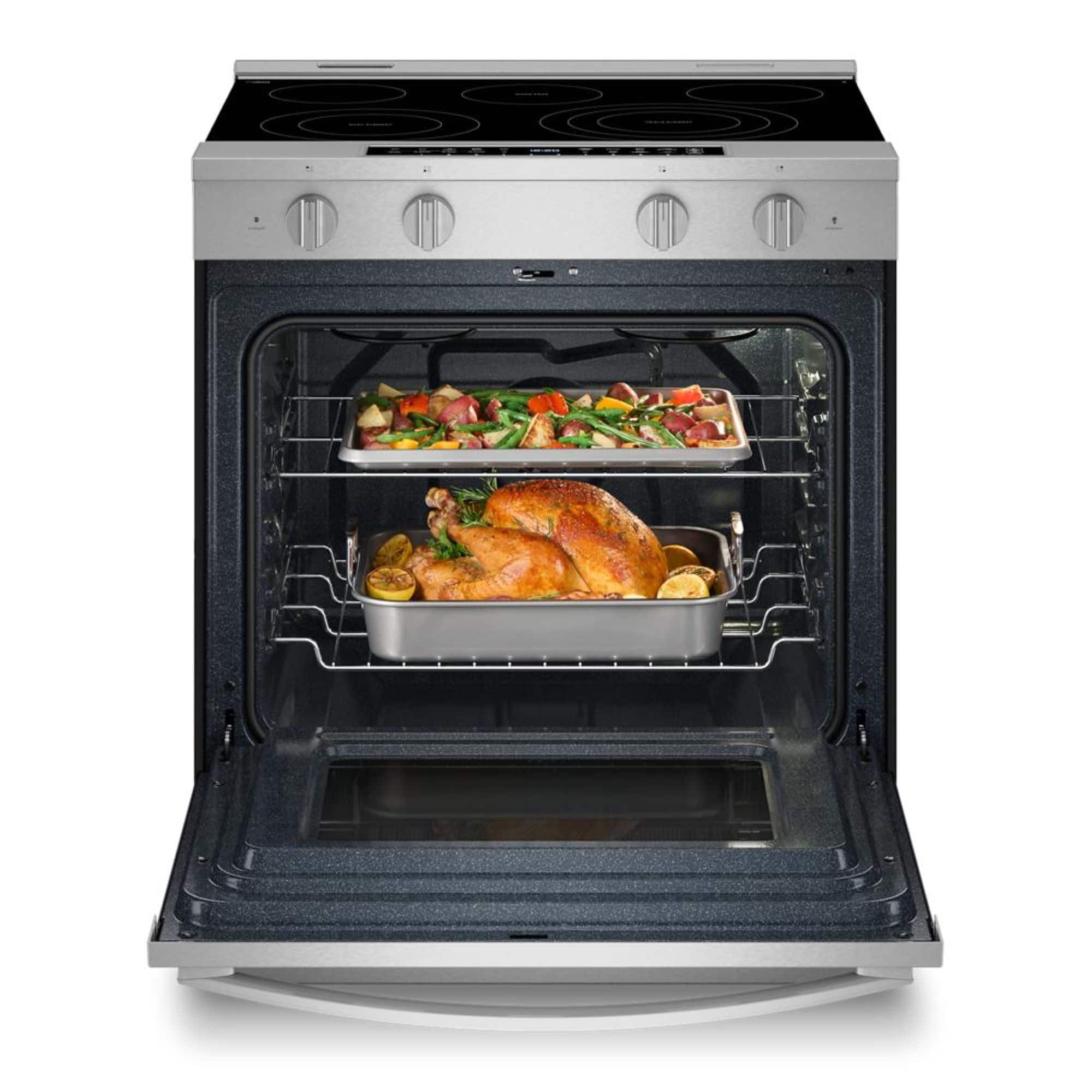 Left. Whirlpool - 5.3 Cu. Ft. Slide-In Electric True Convection Range with Air Cooking Technology and WipeClean Coating - Fingerprint Resistant Stainless Steel.