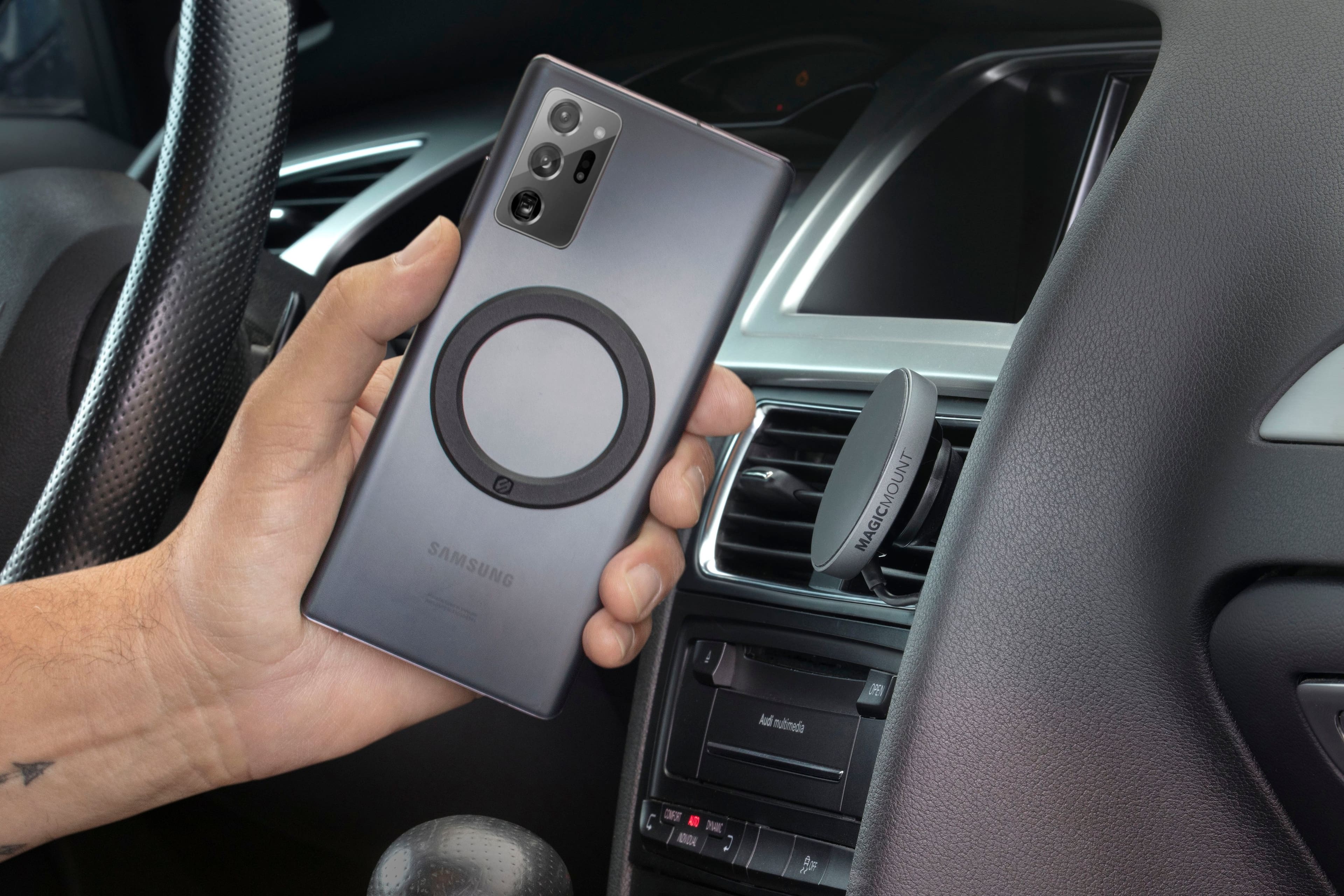 Samsung MagicMount is a versatile mount that allows you to securely hold your smartphone in various positions, such as in a car, on a desk, or on a wall. It features a strong suction cup that attaches to flat surfaces, and a flexible arm that can be adjusted to accommodate different angles and orientations. The MagicMount also has a built-in stand that can be used to prop up the phone for hands-free viewing. With its sleek design and practical functionality, the Samsung MagicMount is a convenient and useful accessory for any smartphone user.