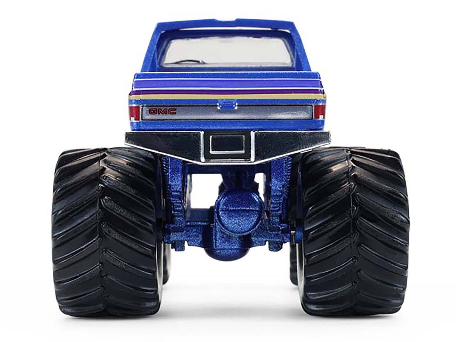 Alt View 1. Greenlight - 1982 GMC Sierra 2500 Monster Truck "Moonshiner!" Blue Metallic with Stripes "Kings of Crunch" Series 16 1/64 - Blue Metallic with Stripes.