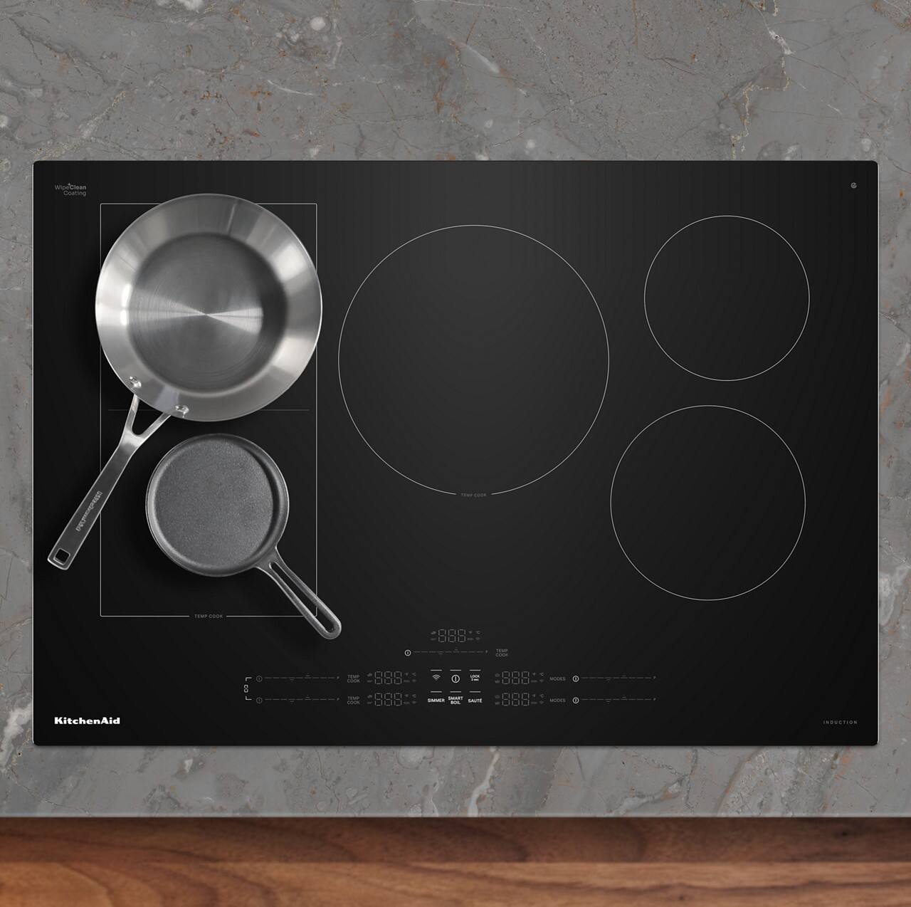 Sure, here is the corrected and grouped text from the image:

---

**KitchenAid**

**Induction Cooktop**

- **Top Cook**
- **Top Cook**
- **Top Cook**
- **Top Cook**

**Control Panel:**

- **888**
- **888**
- **888**
- **888**

**Modes:**

- **888**
- **888**
- **888**
- **888**

**Induction**

---

This text is organized based on the layout and labels visible on the induction cooktop in the image.
