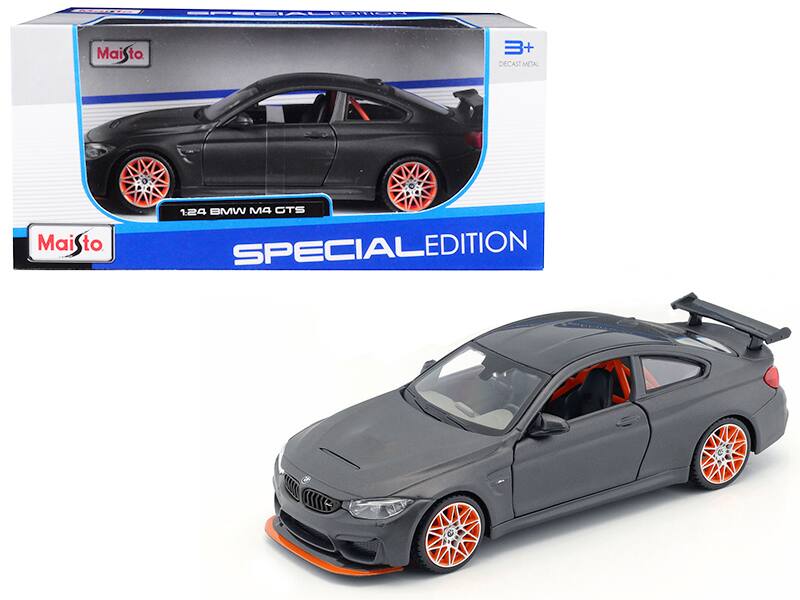 BMW M4 GTS with Carbon Top and Orange Wheels 1/24 Diecast Model Car by Maisto - Gray