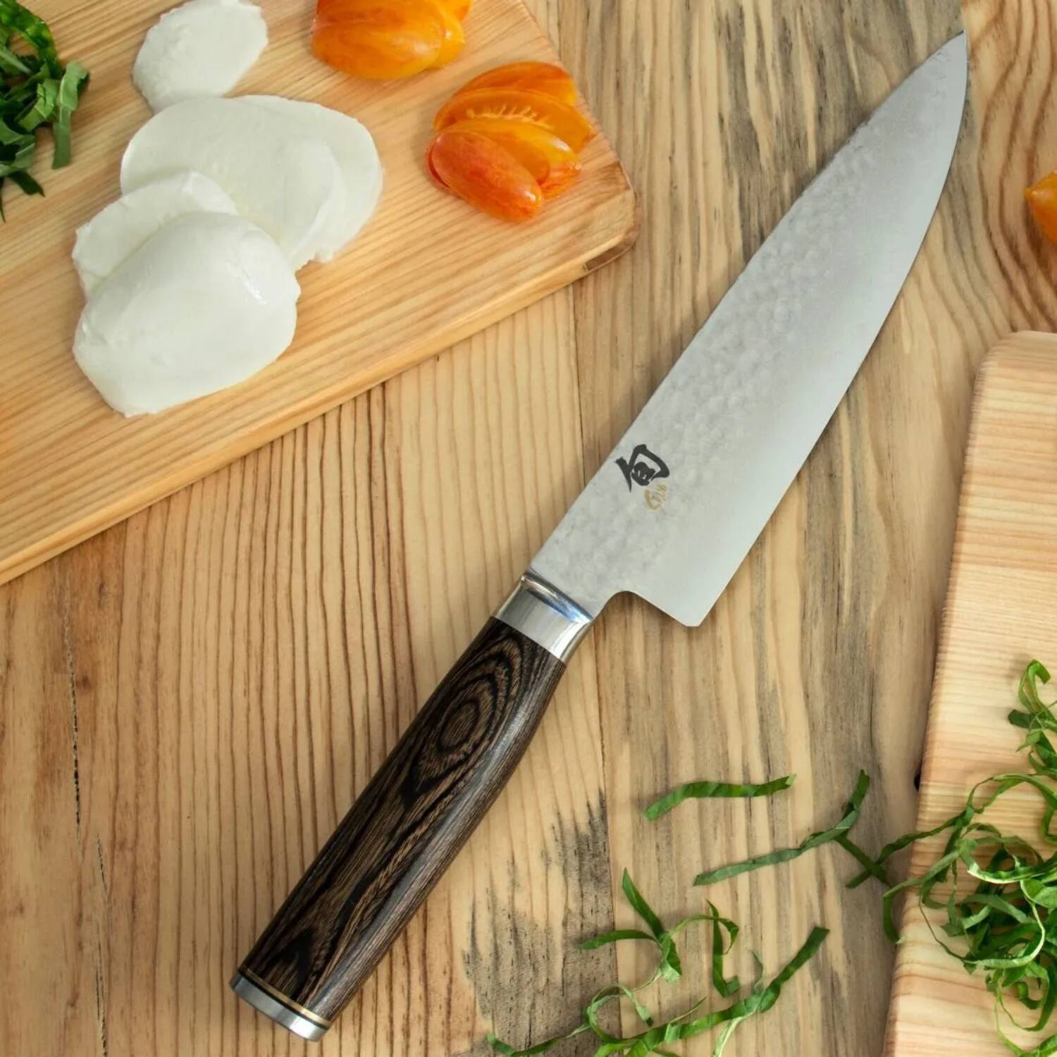 Left. Shun - Premier Chef's Knife, 8 Inch.