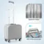 The image features a zipperless design suitcase with a silent rebound handle. The suitcase is white and has a handle that allows for easy transportation. The zipperless design is a unique feature that sets it apart from traditional suitcases. The suitcase is also equipped with a silent rebound handle, which provides a smooth and quiet experience when pulling or pushing it.