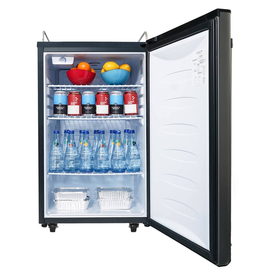The image shows a small refrigerator with its door open, revealing a variety of food items and drinks. There are several bottles of water, as well as a bowl and a cup. The refrigerator is filled with a mix of food and drinks, making it a convenient and well-stocked appliance for everyday use.