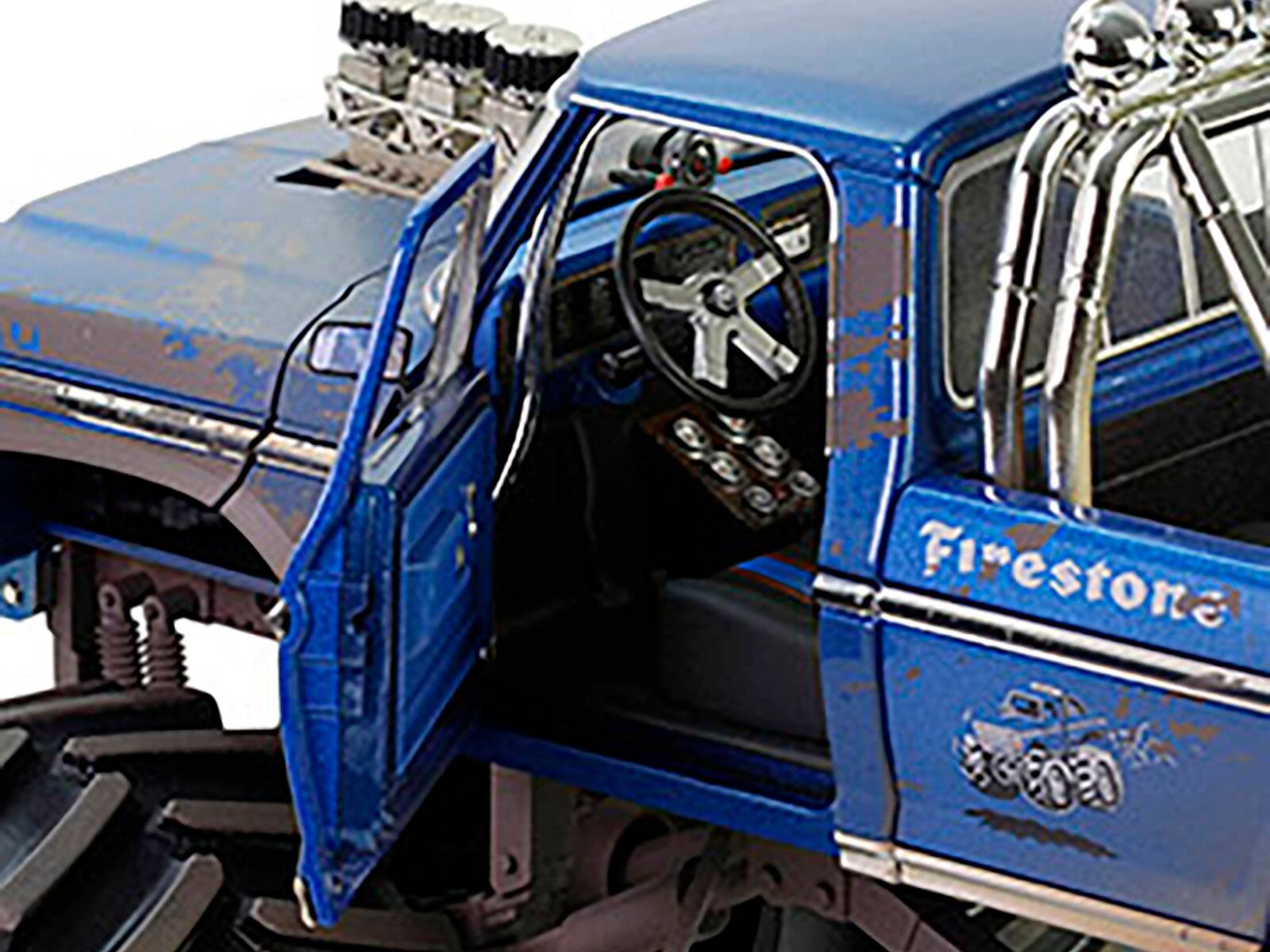 Angle. Greenlight - 1974 Ford F-250 Monster Truck with 66-Inch Tires Blue "Bigfoot #1" (Dirty Version) "Kings of Crunch" Series 1/18 - Blue.