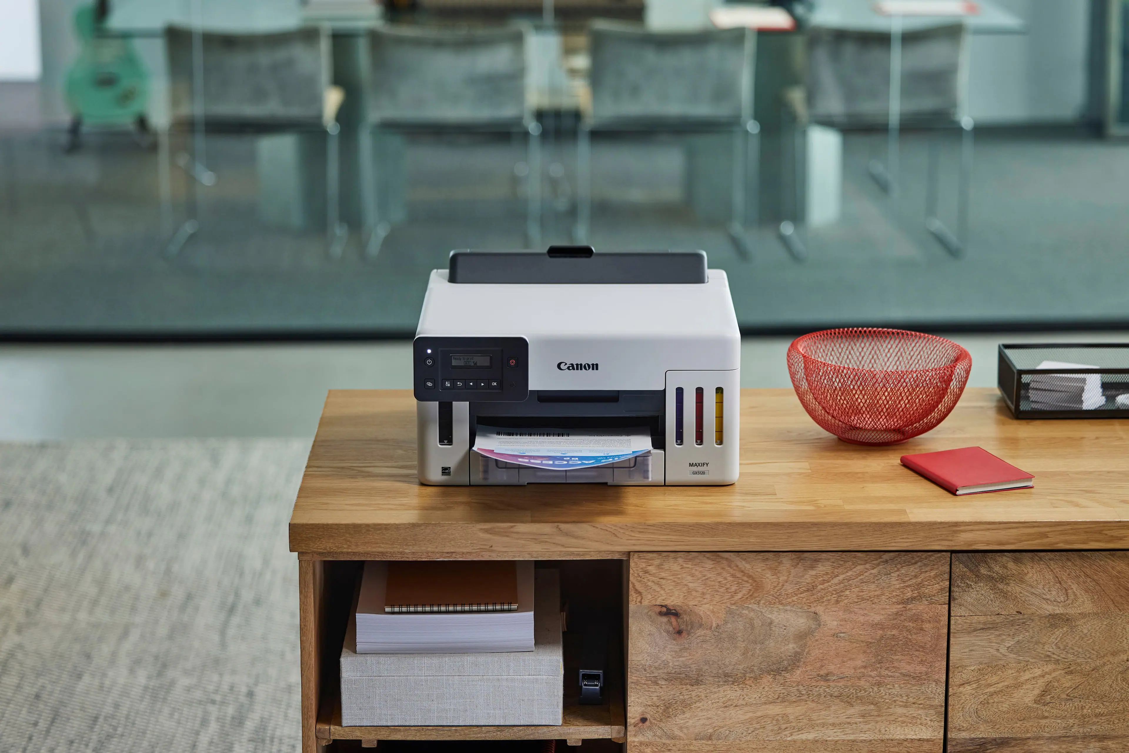 Canon EL printer on a wooden desk.