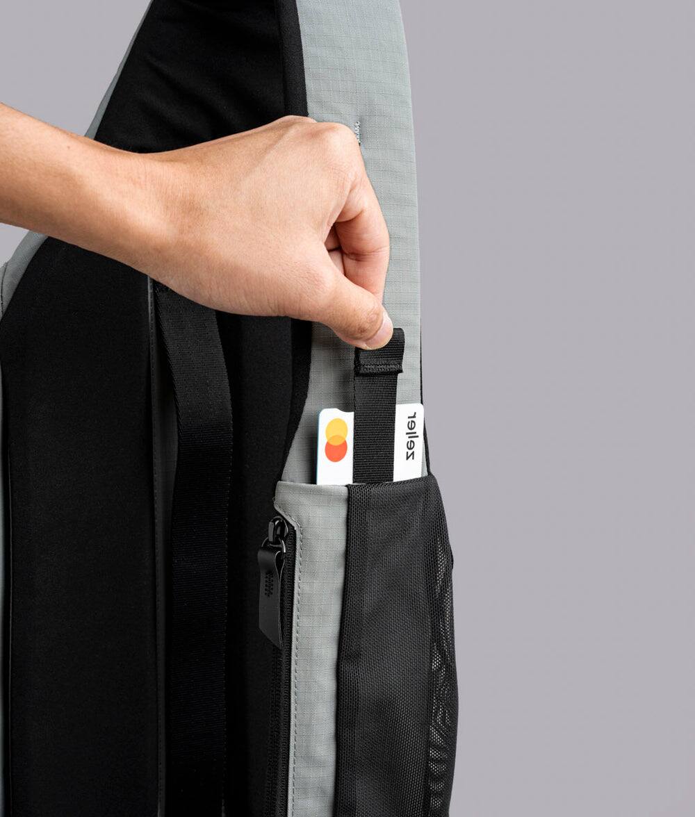 Alt View 8. ALPAKA - Crossbody Sling Bag 7.5L (Left Shoulder) for Men, Fits 11" Tablet, Phone Sleeve, Bottle Pocket, Luggage Pass-Through - Grey Axoflux 210D.