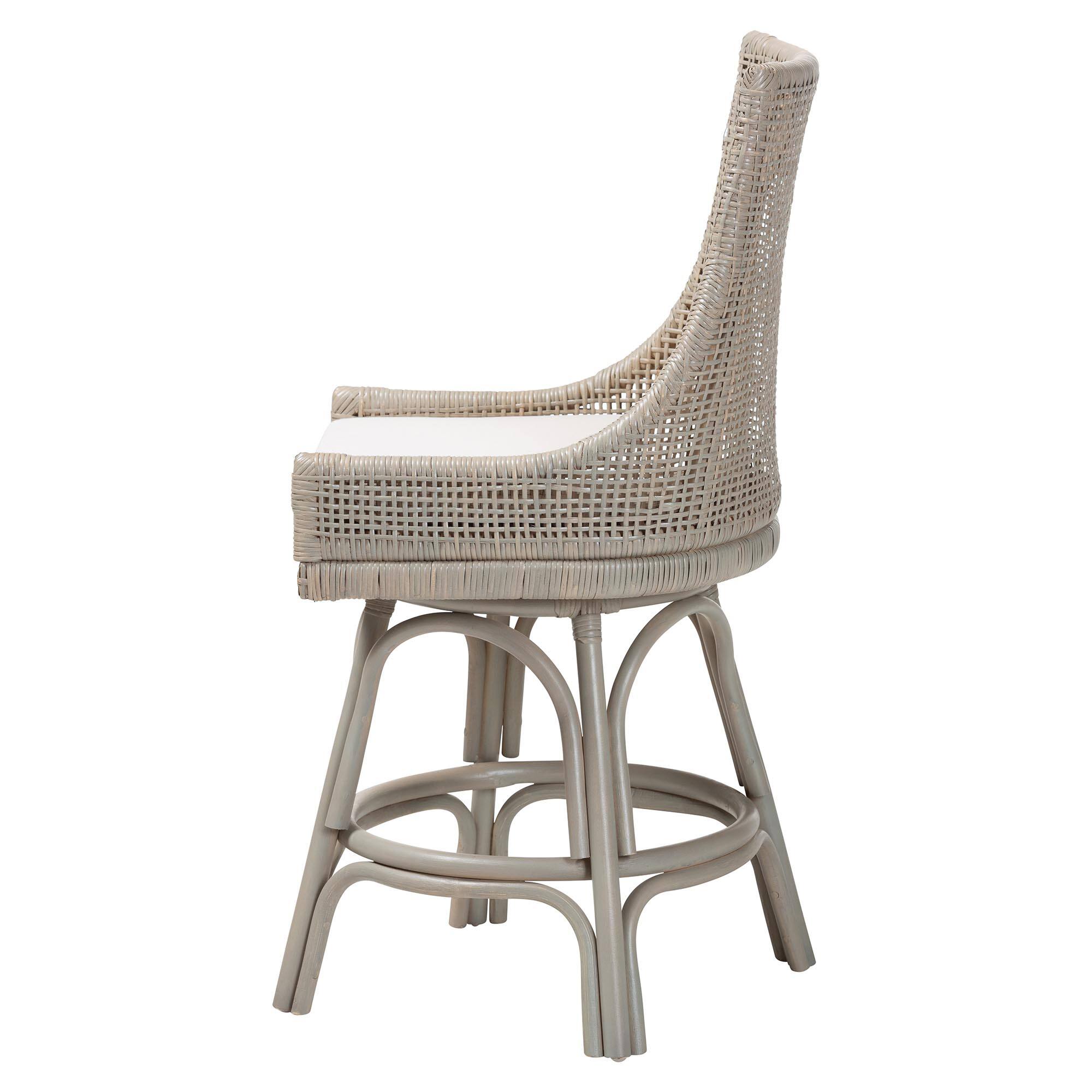 Angle. bali & pari - Bella Swivel Rattan Counter Stool with Cushion - Handwoven Wicker Kitchen Island Seating with Backrest and Footrest - French Grey.