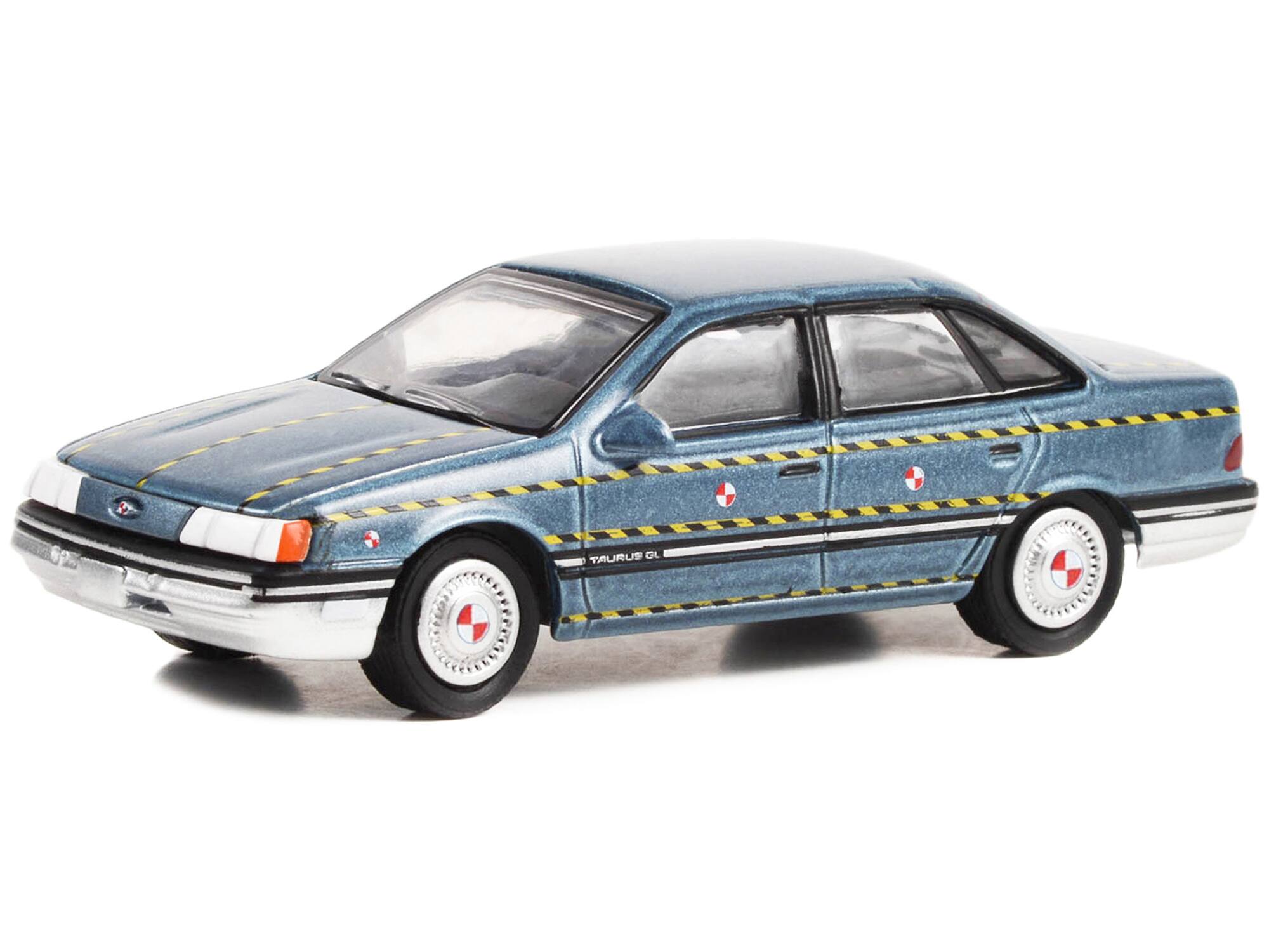 Alt View 1. Greenlight - 1986 Ford Taurus Blue Met. "Zalinsky Auto Parts" Crash Test Vehicle "Tommy Boy" 1995 Movie 1/64 Model Car by Greenlight.