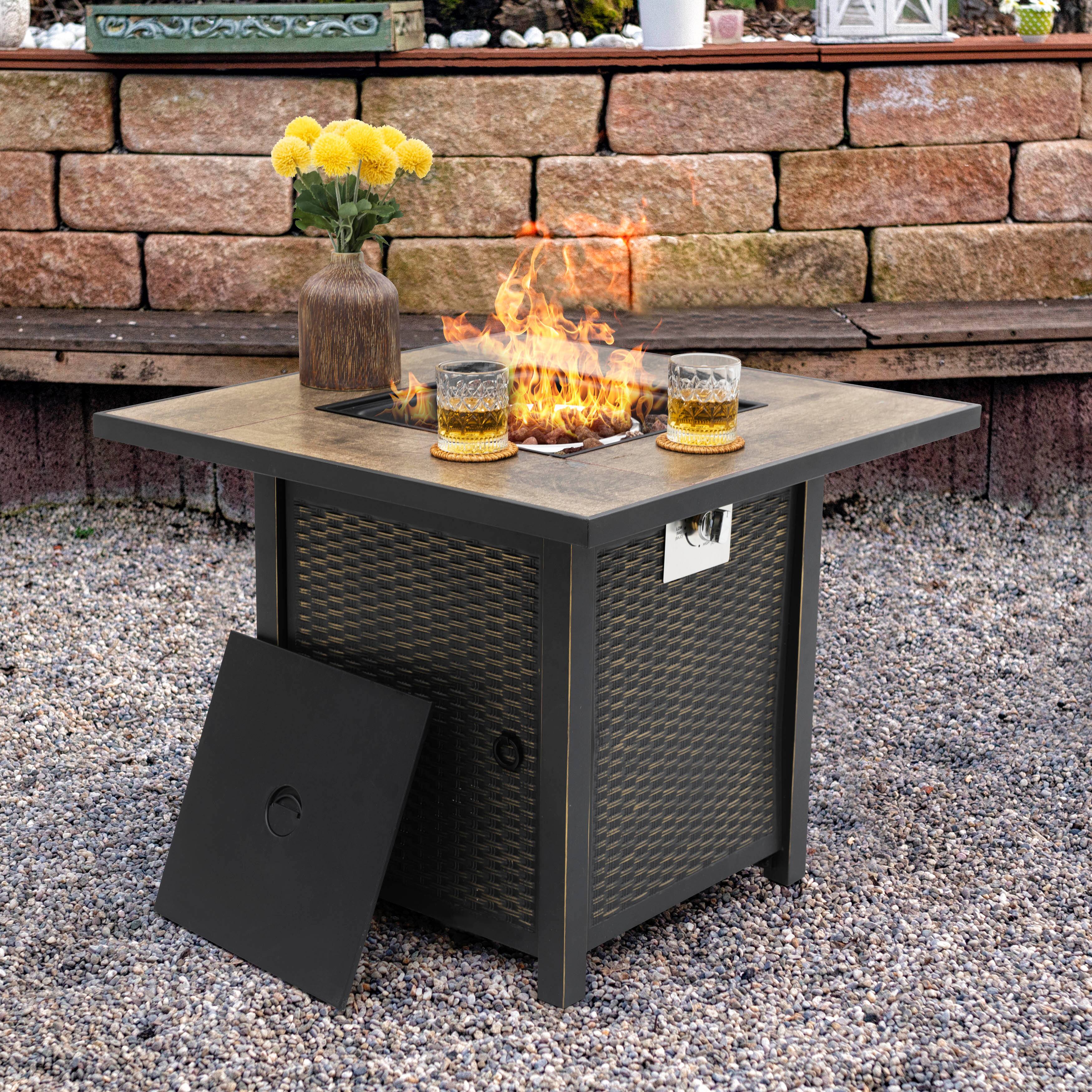 Left. Nuu Garden - 30'' Outdoor Metal Gas Fire Pit Table with Lid and Lava Rocks - black with gold-painted edge, brown.