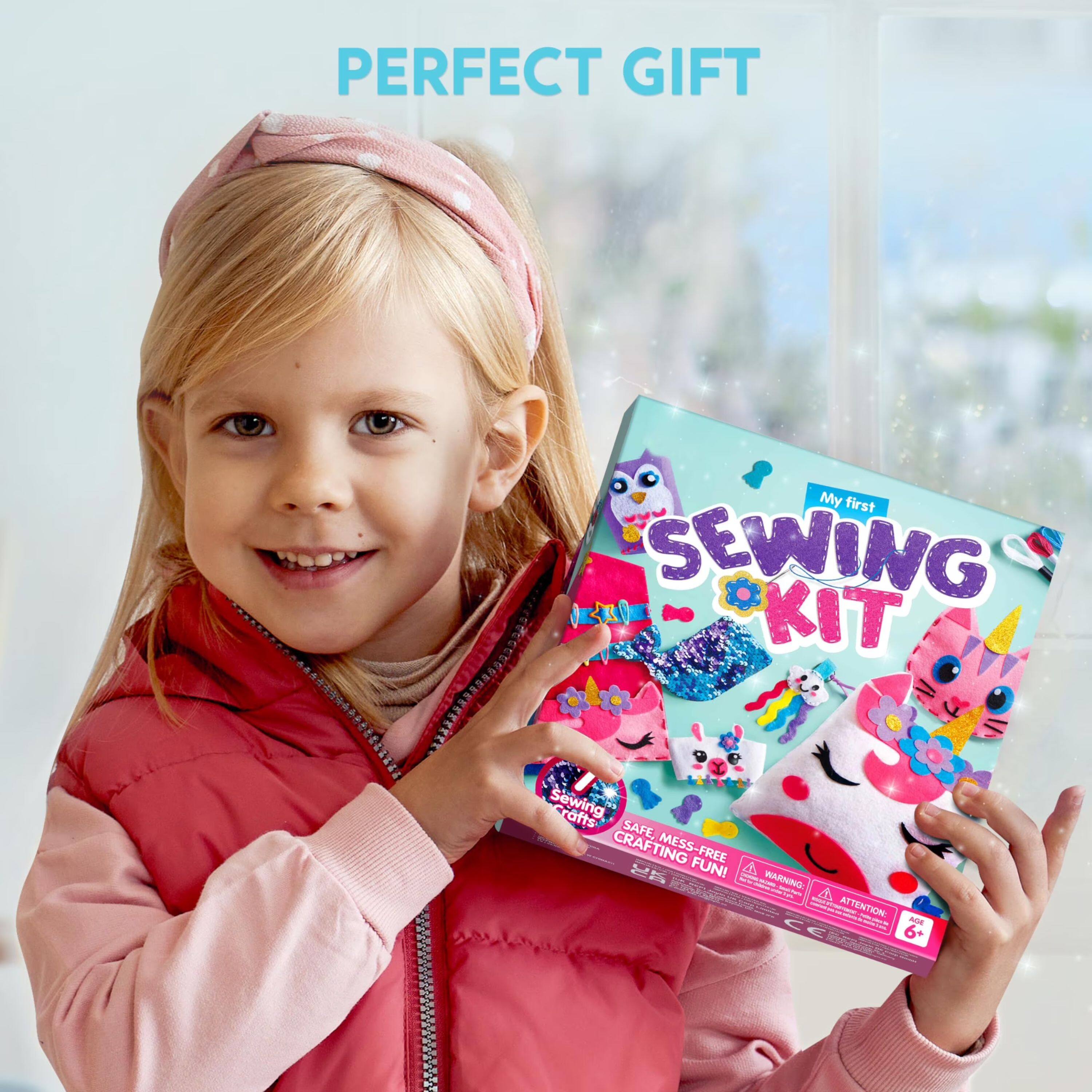 PERFECT GIFT

My first SEWING KIT

Sewing Crafts SAFE, CRAFTING MESS-FREE FUN!

WARNING: Carbohy

ATTENTION: I - AGE CE 6+