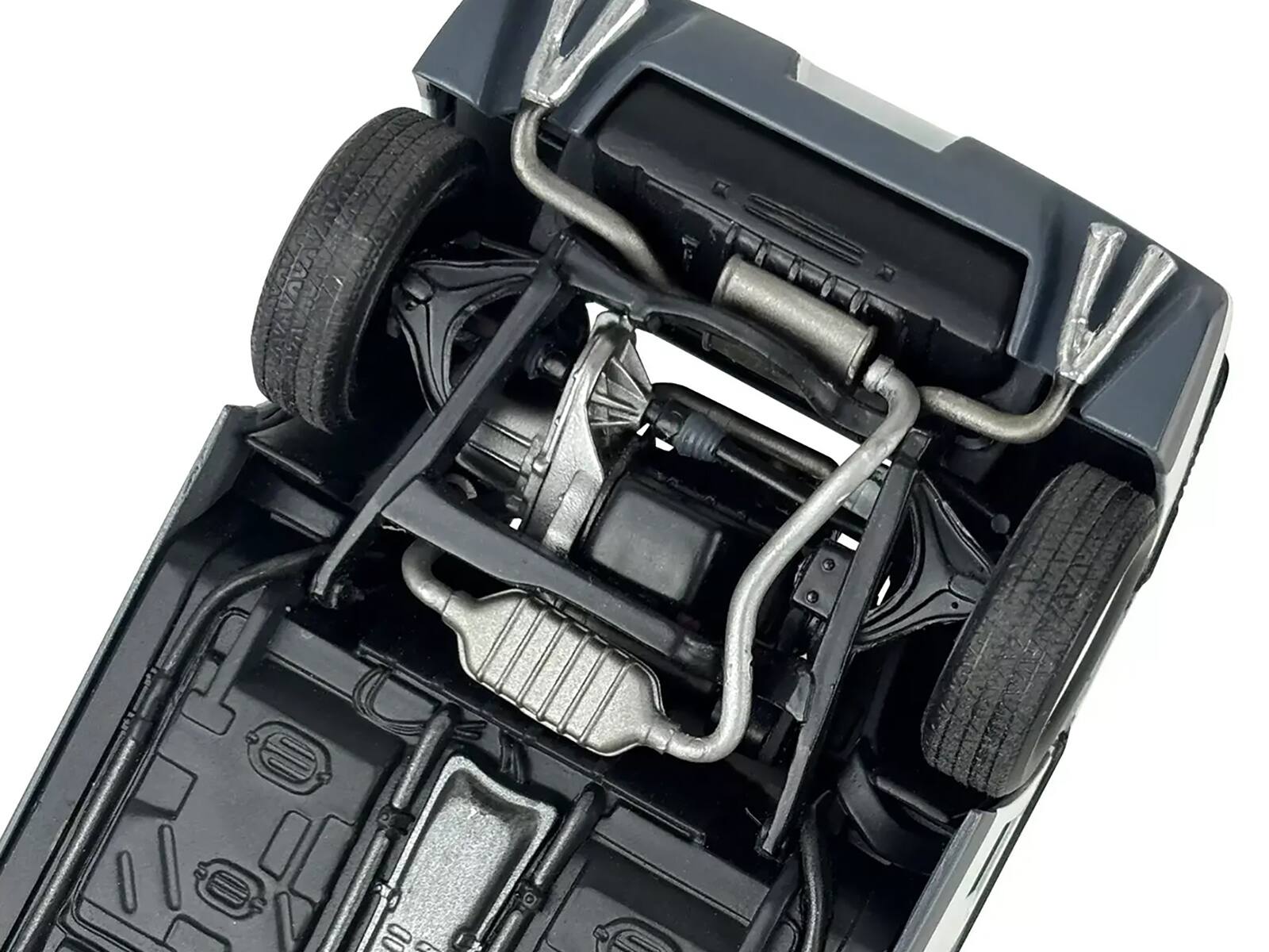 Back. Revell - Level 4 Model Kit 1985 Pontiac Fiero GT 1/24 Scale Model by Revell - White.