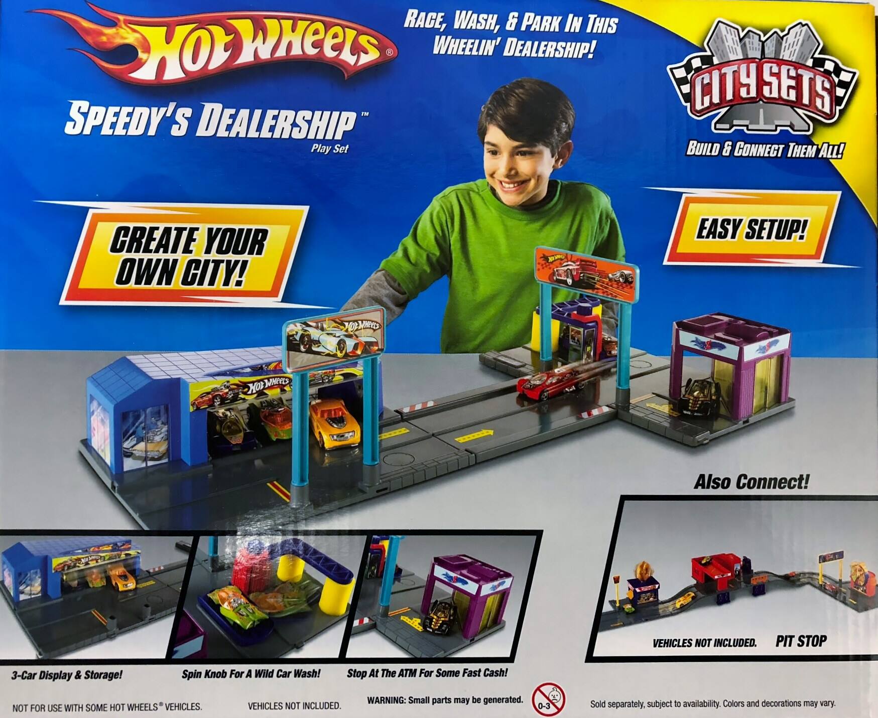 **Hot Wheels Speedy's Dealership Play Set**

- **RACE, WASH, & PARK IN THIS WHEELIN' DEALERSHIP!**
- **CREATE YOUR OWN CITY!**
- **EASY SETUP!**
- **CITY SETS - BUILD & CONNECT THEM ALL!**
- **3-Car Display & Storage!**
- **Spin Knob For A Wild Car Wash!**
- **Stop At The ATM For Some Fast Cash!**
- **NOT FOR USE WITH SOME HOT WHEELS VEHICLES.**
- **VEHICLES NOT INCLUDED.**
- **WARNING: Small parts may be generated.**
- **0-3 Sold separately. Subject to availability. Colors and decorations may vary.**
- **Also Connect!**
- **PIT STOP**