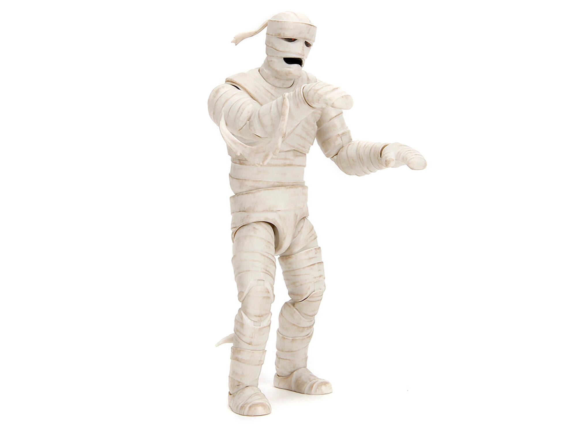 Angle. Jada - Ankha 7" Moveable Figure with Accessories and Alternate Head and Hands "Scooby-Doo!" Franchise Model by Jada - White.