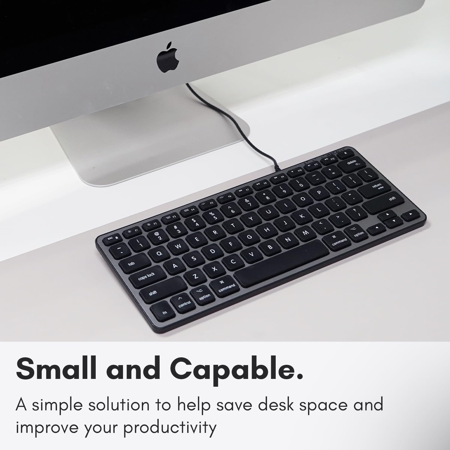 The text in the image reads:

"Small and Capable.
A simple solution to help save desk space and improve your productivity."