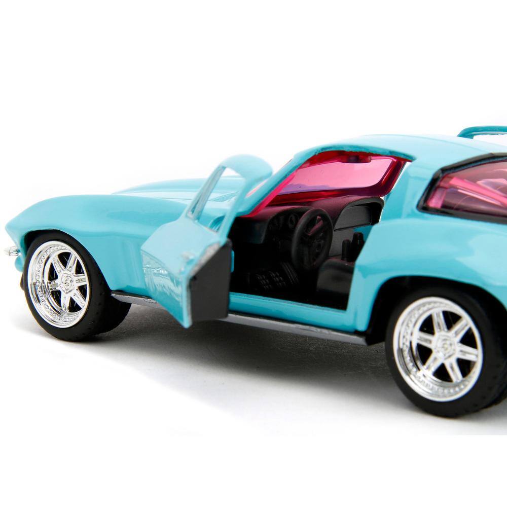Left. Jada - 1966 Chevrolet Corvette Light Blue with Pink Tinted Windows "Pink Slips" Series 1/32 - Light Blue and Pink.