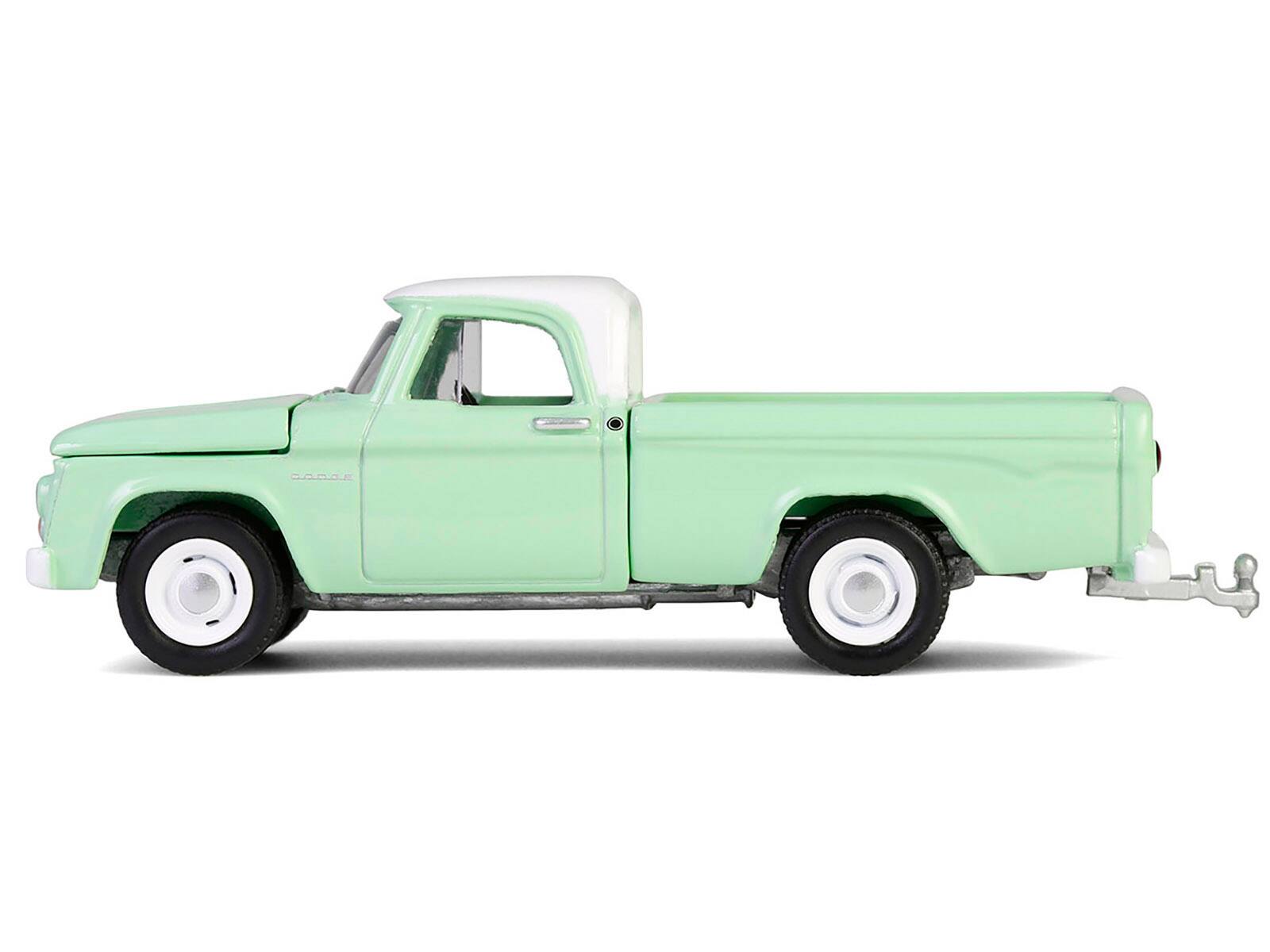 Angle. Greenlight - 1964 Dodge D-200 Sweptline Pickup Truck Turf Green with White Top "Down on the Farm" Series 10 1/64 - Turf Green with White Top.
