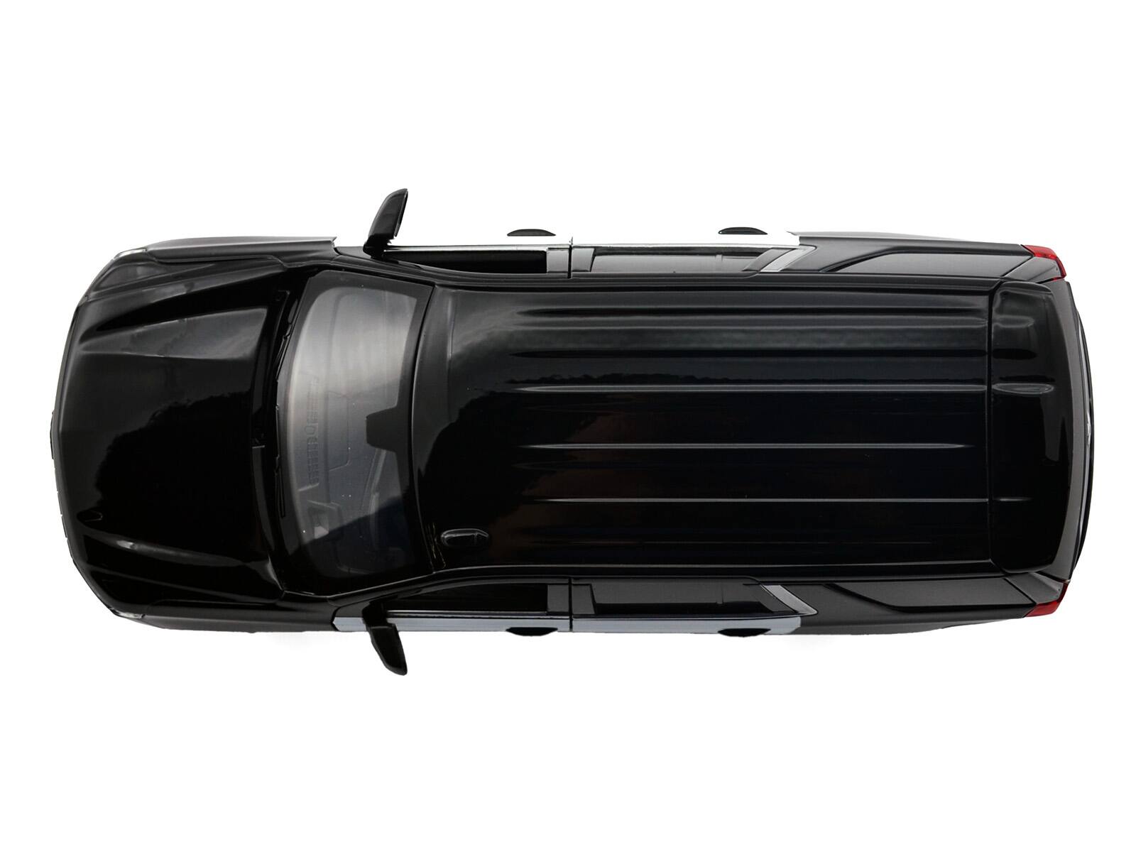 Alt View 5. Motormax - 2025 Chevrolet Tahoe PPV Black & White "Custom Builder's Kit" 1/24 Diecast Model Car by Motormax.